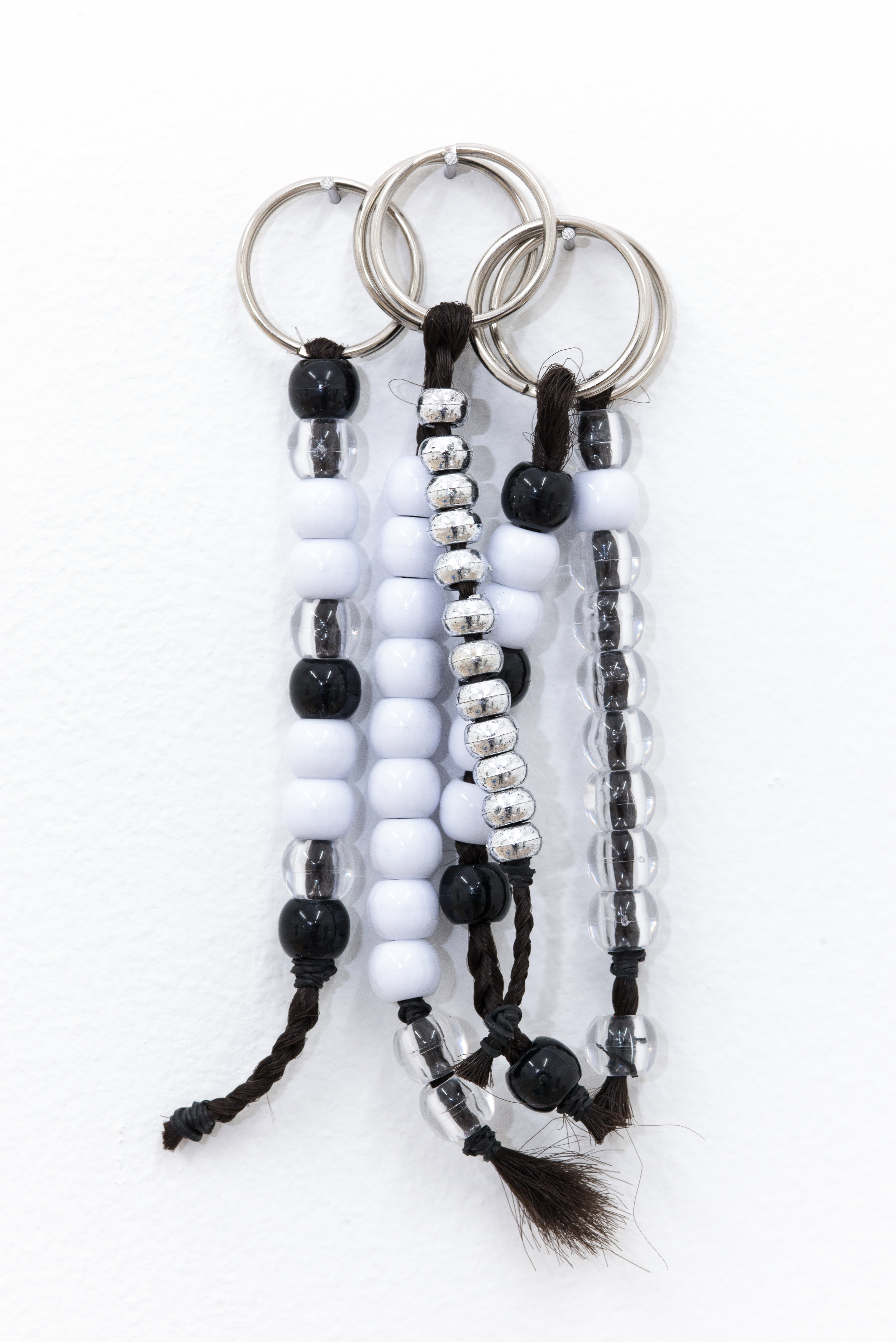 Diamond Stingily Keychains, 2015 Kanekalon hair, beads, elastic, silver keys rings Dimensions variable