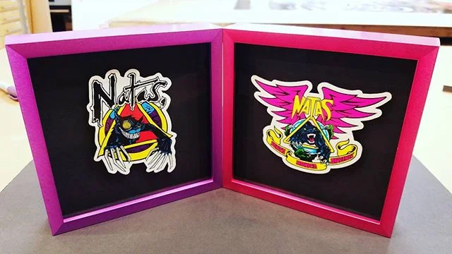 Framed some Natas Kaupas stickers in neon metal. Float and lift in metal frames=doing the "impossible". #santamonicaairlines #natas #pictureframe #customframing #stickers #oldschool #skateboarding