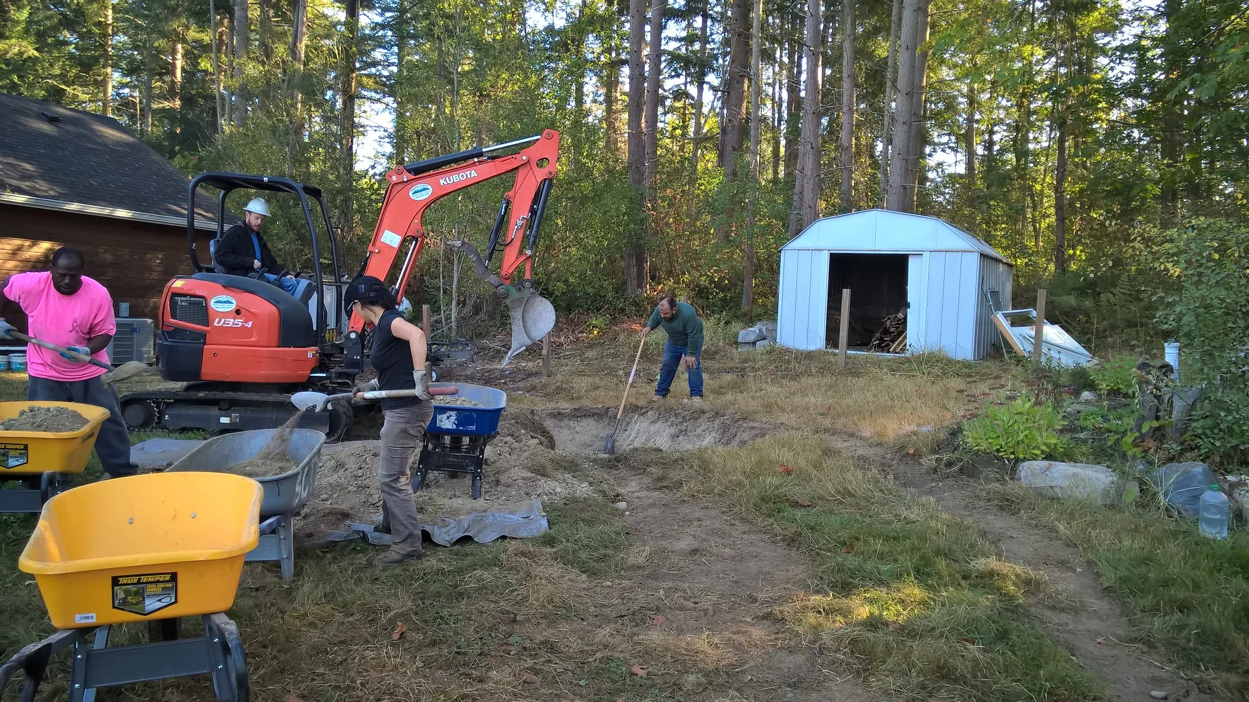 The crew begins the digging out process.