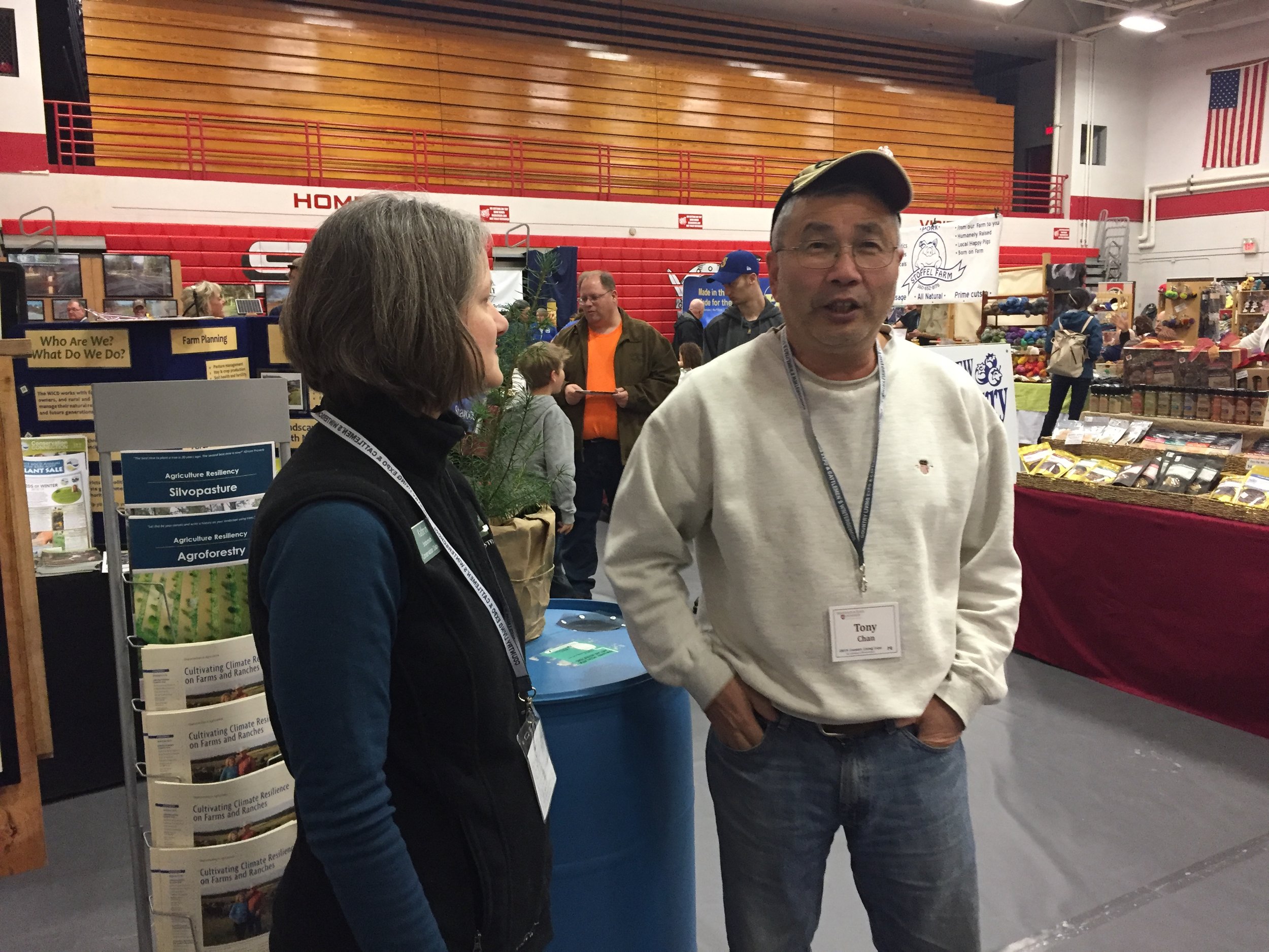 Kathryn speaking to a Skagit farmer