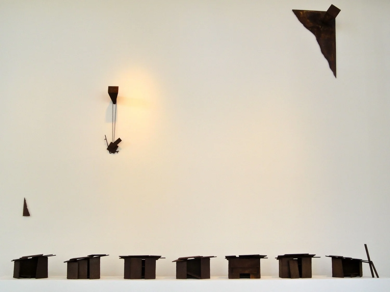 "Small shrine to "M" and models for "Skid Row".