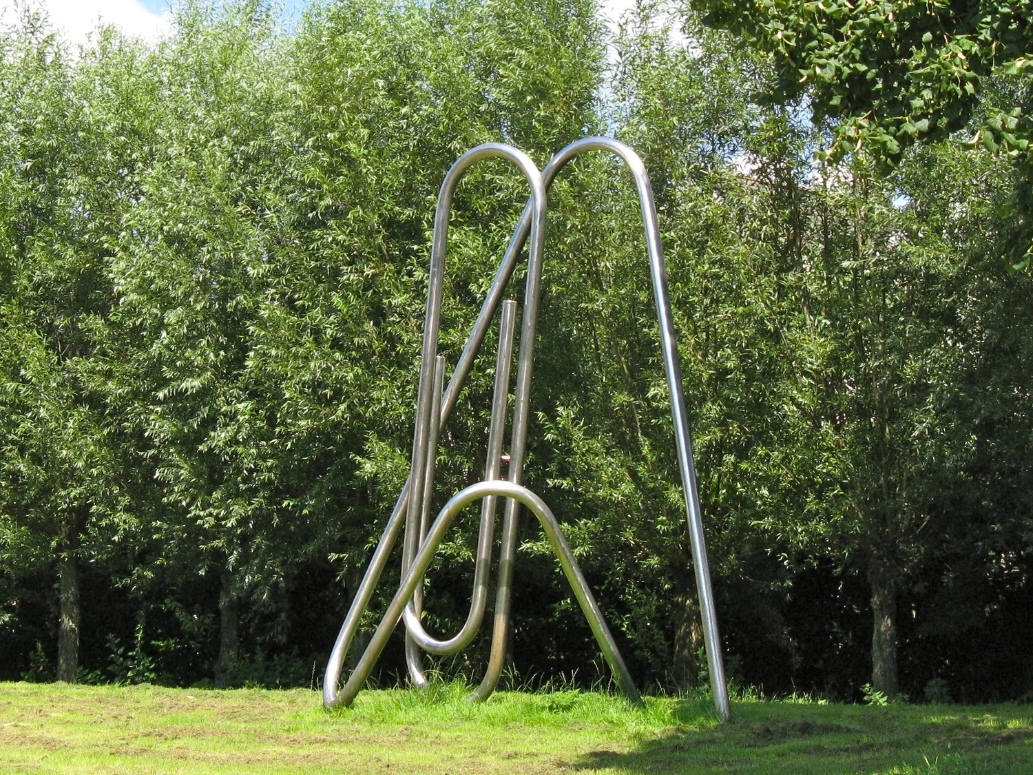 "Paperclip", 14 ' high, stainless steel, 1986.