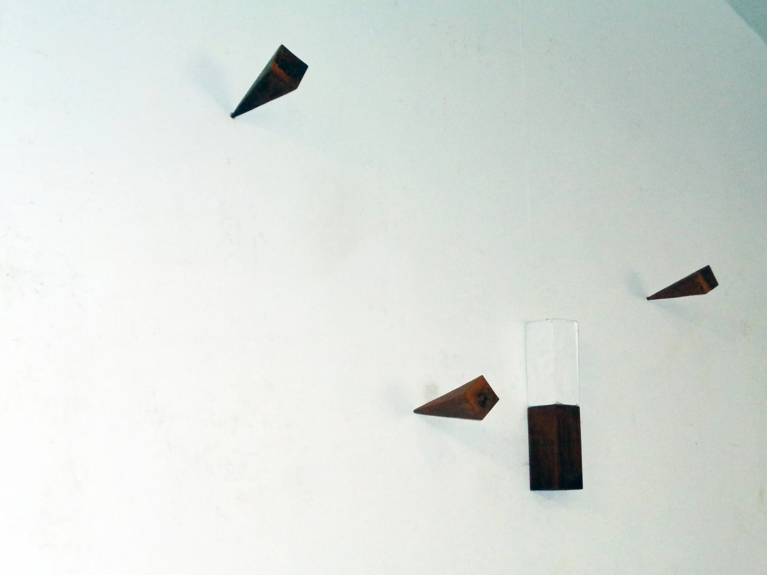 "Near miss or almost a hit". Steel and plaster. Dimensions variable.