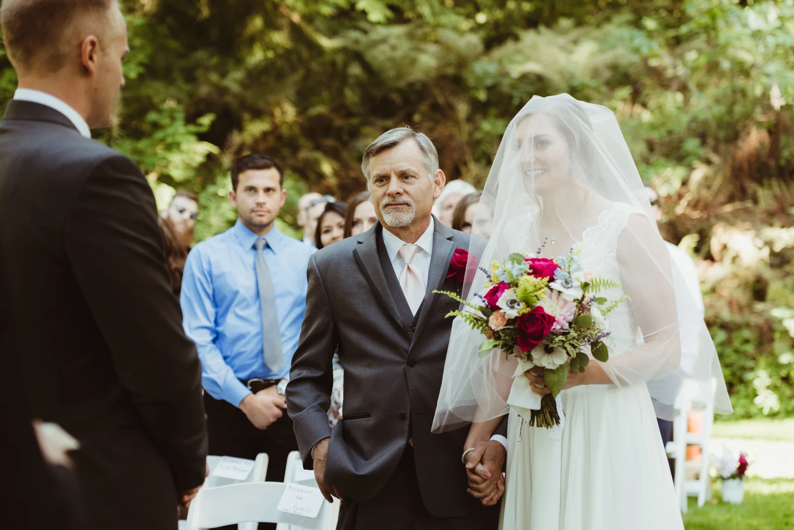Father and daughter walking down the aisle