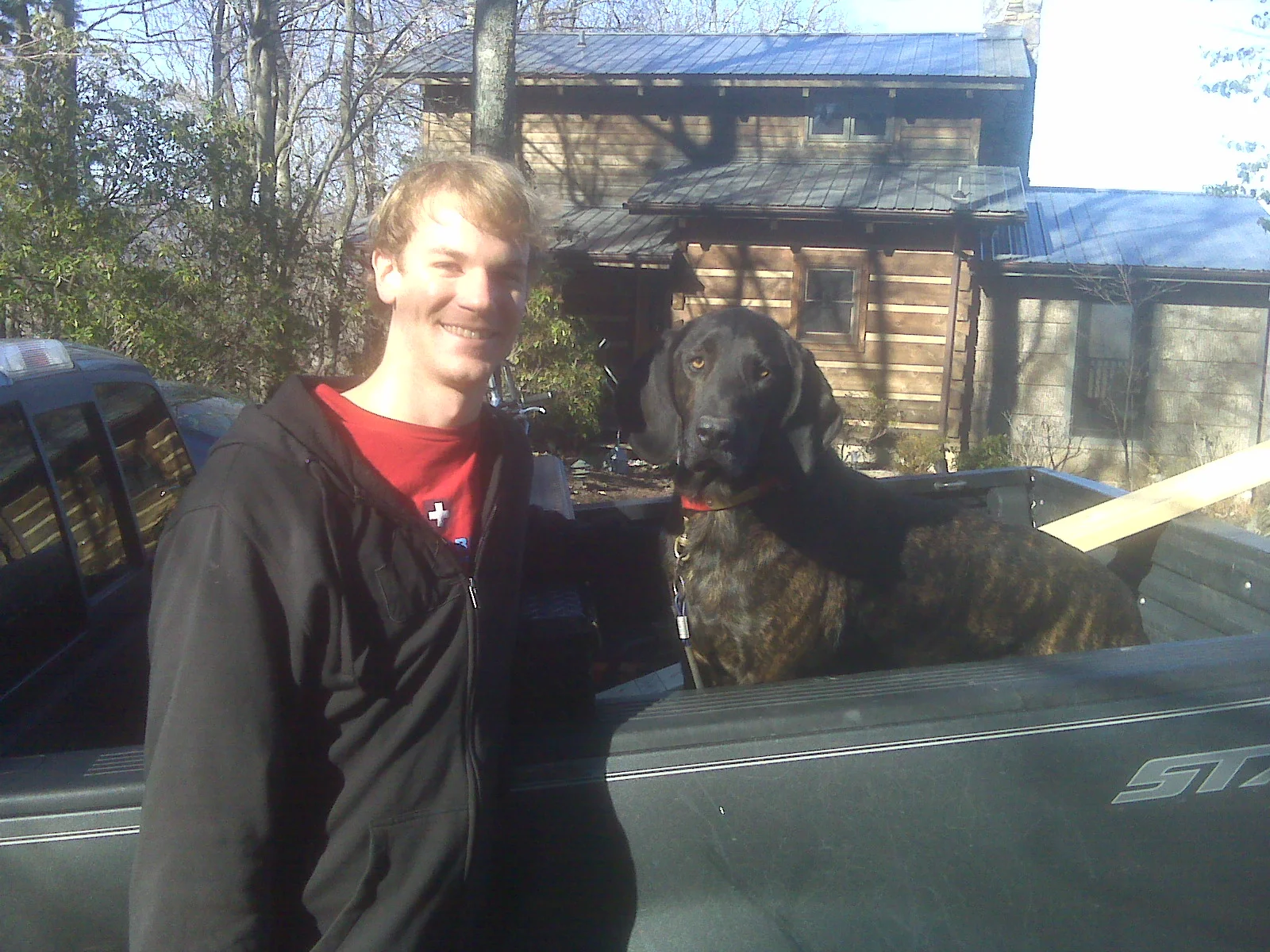 Ted Edmunds with his dog, Wylie. Wylie is a Plott Hound, the official state dog of North Carolina.
