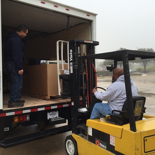 R2Sector team members unload from an e-cycling run.