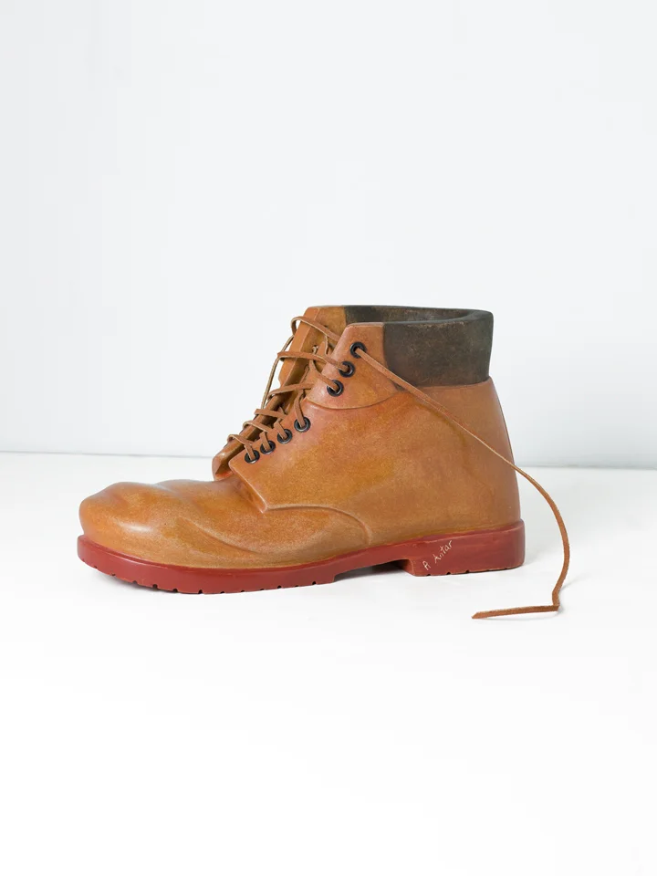 Robin Antar, Work Boots with Rivets Med Brown, 2009, carved limestone and oils, 6.5"h X 11.5"w X 4.5"d