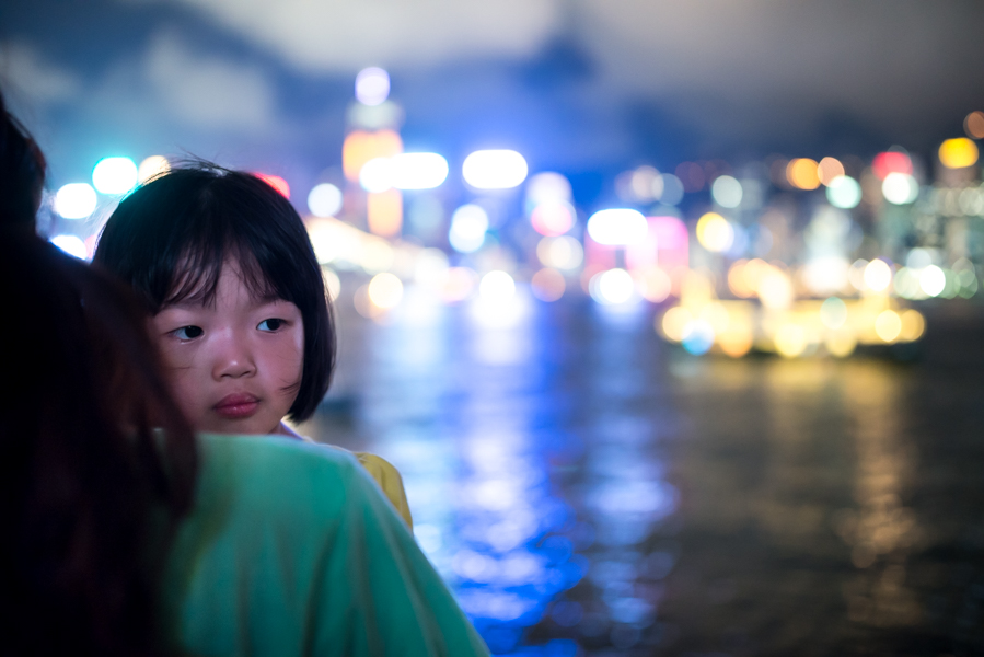A mother and daughter wait for the Symphony of Lights to begin