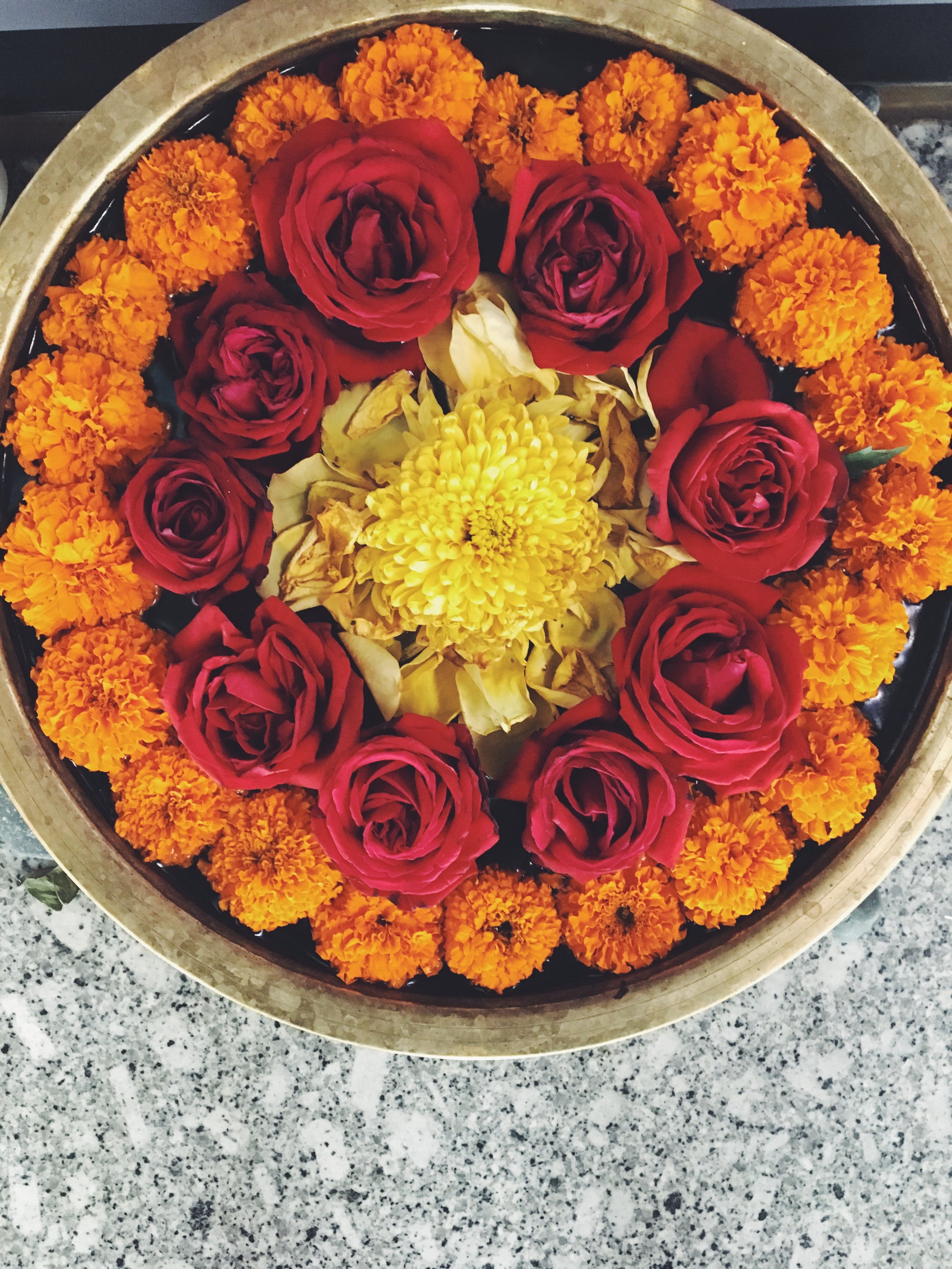  Beautiful flowers in a brass urn at the Kolkata airport.&nbsp; 