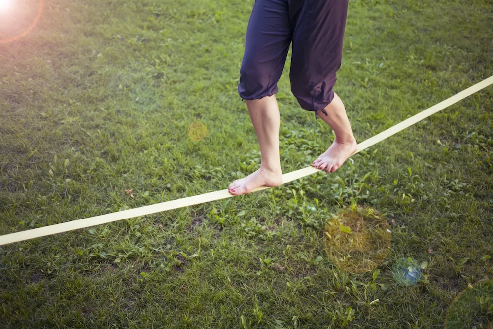 woman balancing tightrope.jpg