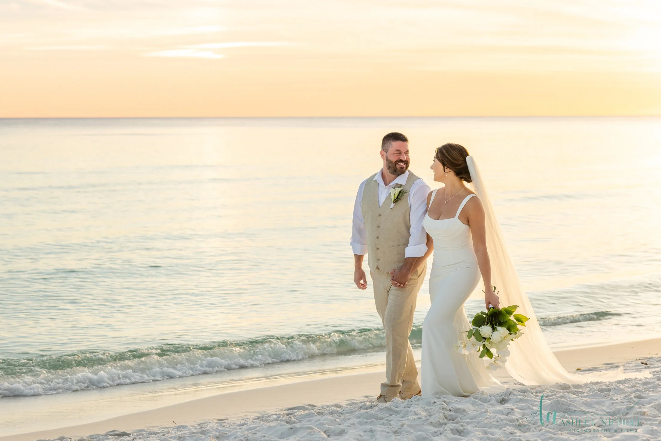bride and groom on the beaches of 30a after their intimate wedding