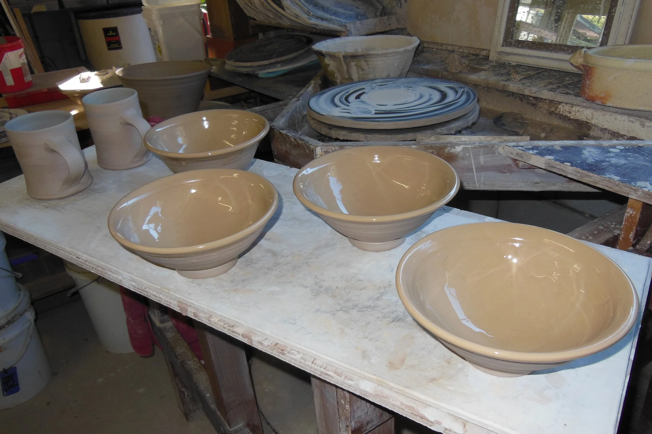 Freshly slipped bowls