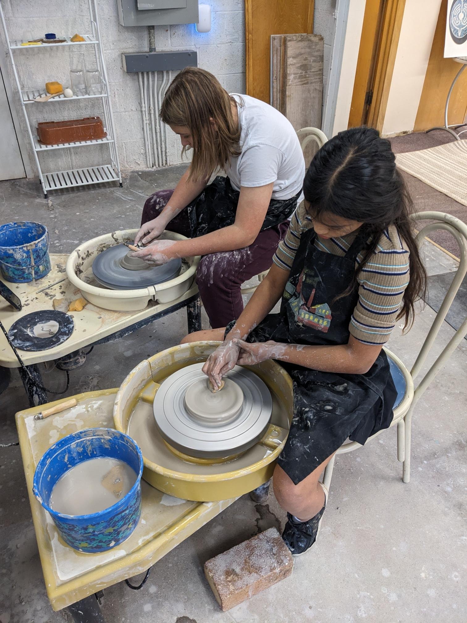 Making pottery on our wheels