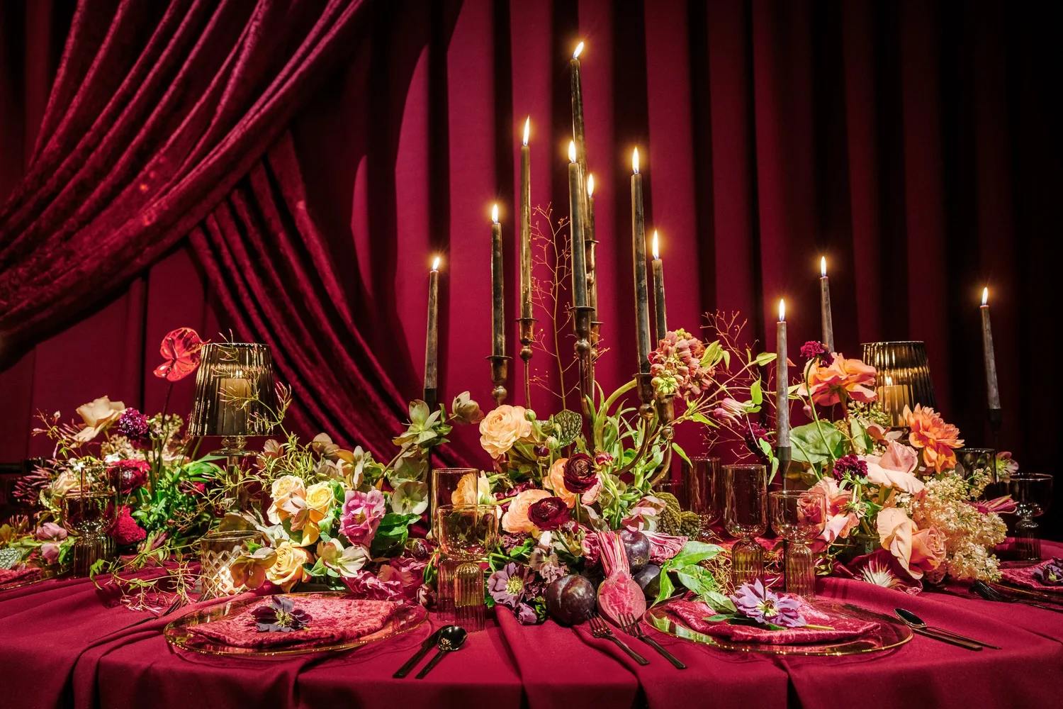 A candlelit reception designed by Bastille Flowers & Events, shown on the homepage concept