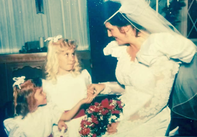 My sister and I as flower girls once upon a time.