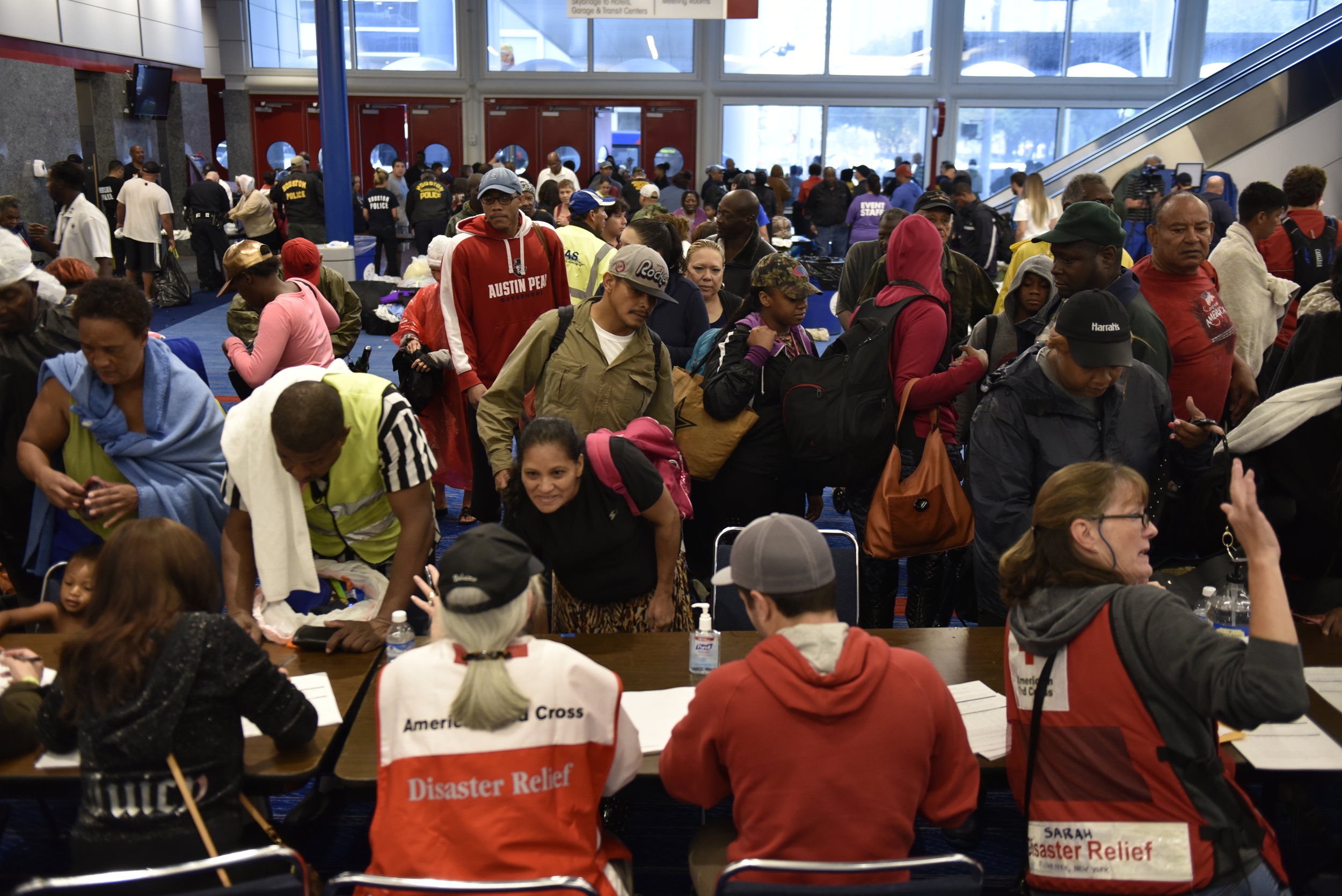  Volunteers with The American Red Cross register evacuees at the George R. Brown Convention Center after Hurricane Harvey inundated the Texas Gulf coast with rain causing widespread flooding, in Houston, Texas, U.S. August 28, 2017.  REUTERS/Nick Oxf