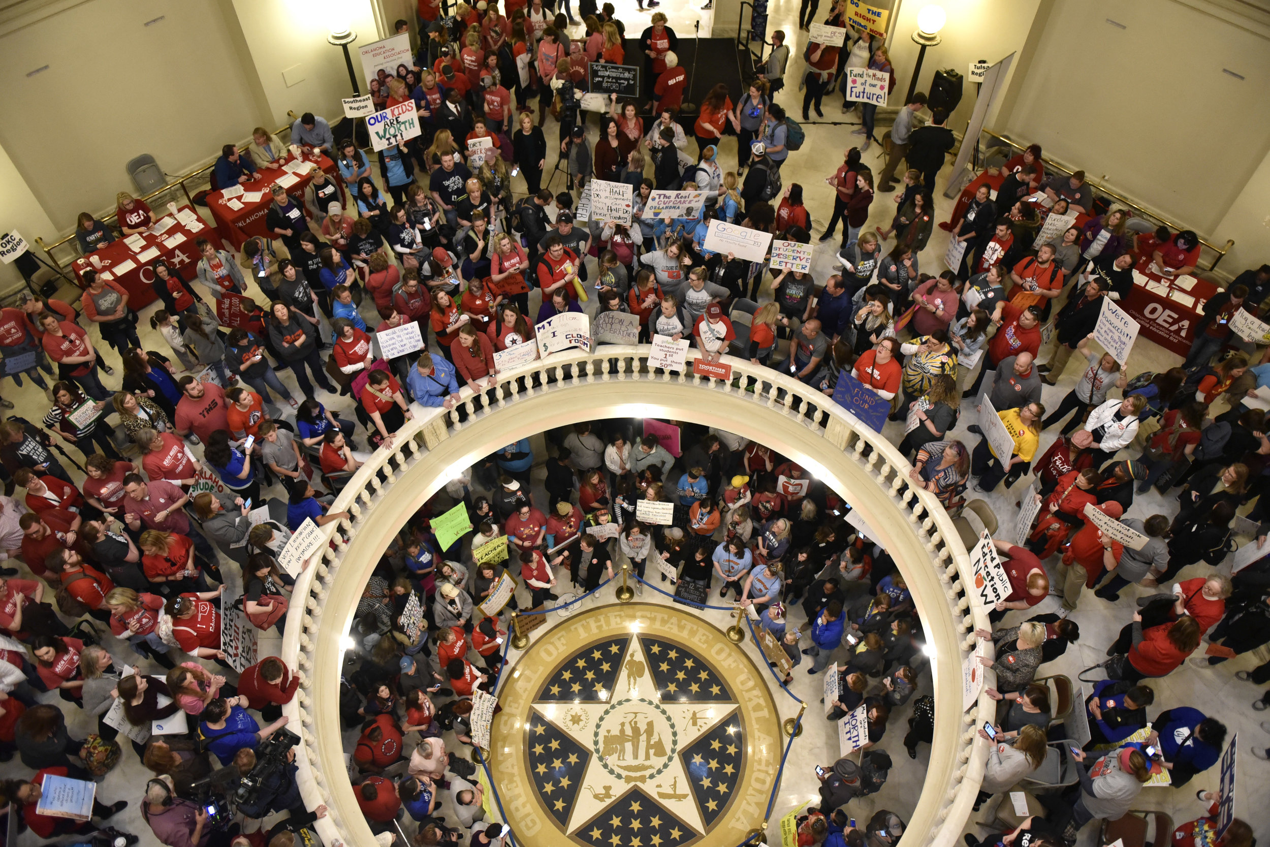  Teachers pack the state Capitol rotunda to capacity on the second day of a teacher walkout to demand higher pay and more funding for education in Oklahoma City, Oklahoma, U.S., April 3, 2018. REUTERS/Nick Oxford 