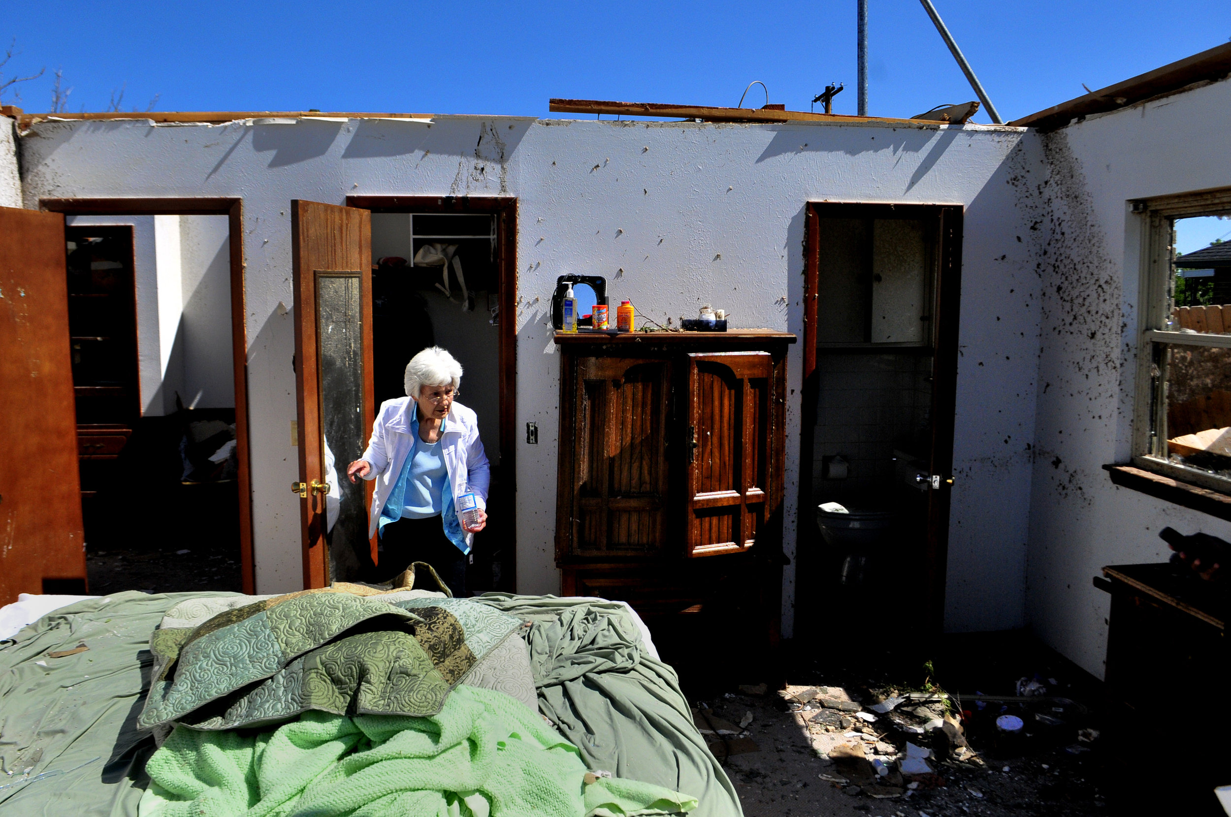  Wilma Nelson, 87, stands in the closet that she took shelter in while a tornado destroyed her home in Woodward Oklahoma on Sunday. Nelson also survived the deadly tornado that struck Woodward Oklahoma on April, 9 1947. 