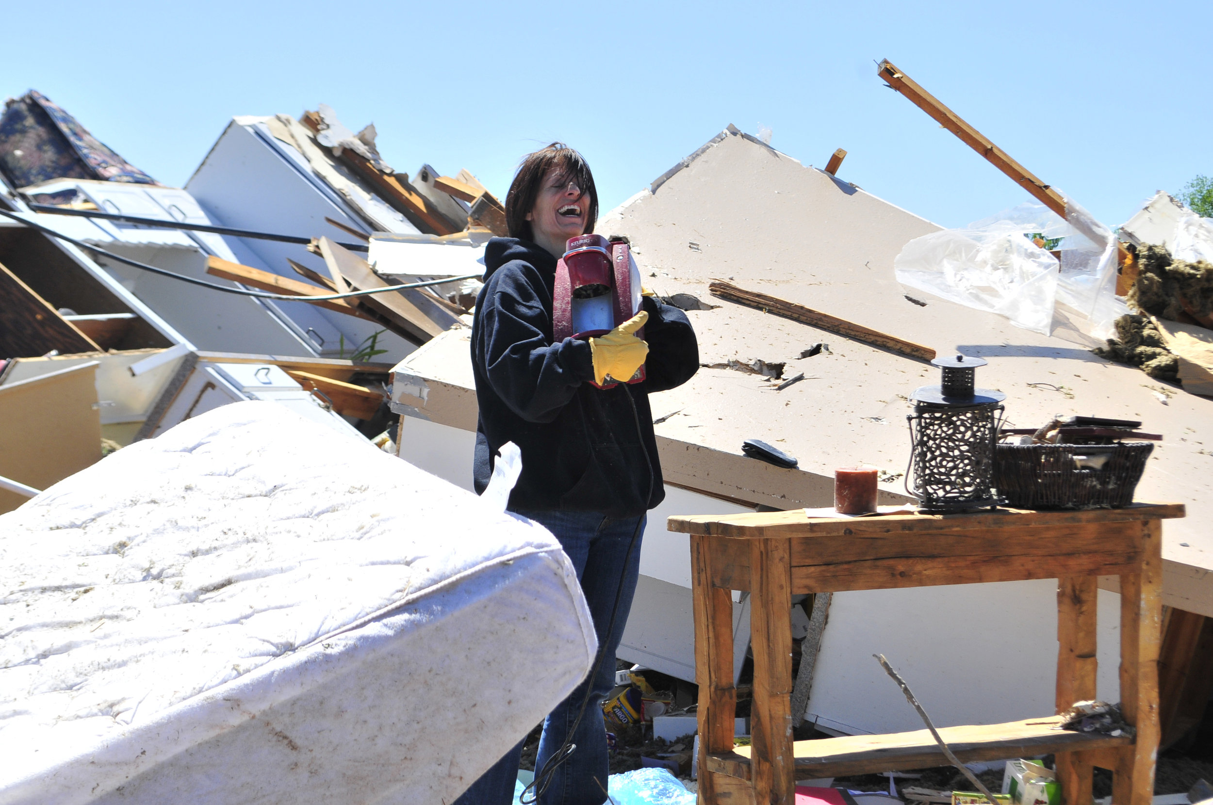  Mikki Ray had a laugh after finding her friends Keurig coffee machine completely intact in what was left behind of her friends home that was destroyed by a tornado that ripped through Woodward Oklahoma early Sunday morning.  