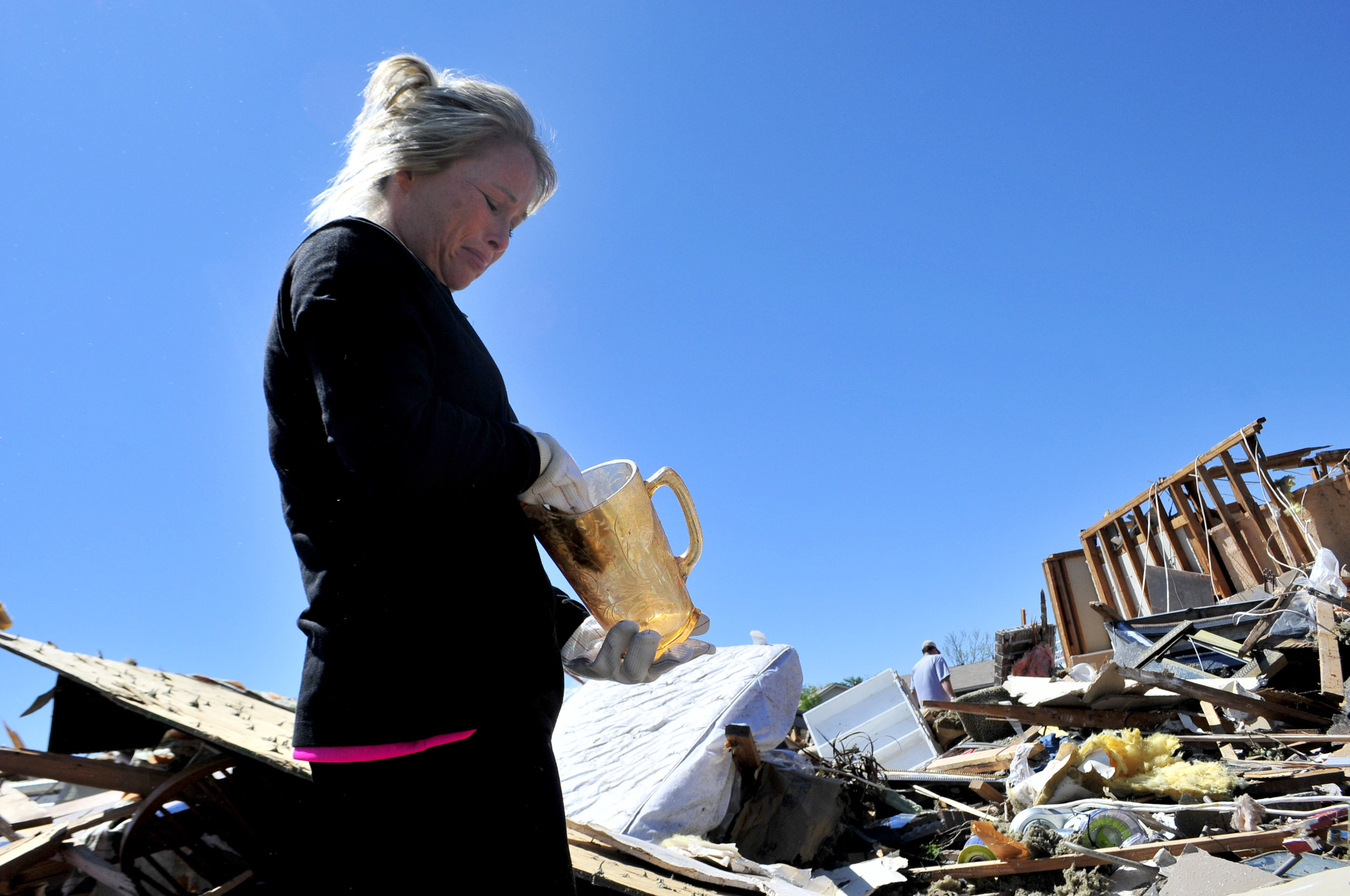  Emilee Neagle got emotional after finding her grandmothers pitcher in what was left behind of her home that was destroyed by a tornado that ripped through Woodward Oklahoma early Sunday morning.  