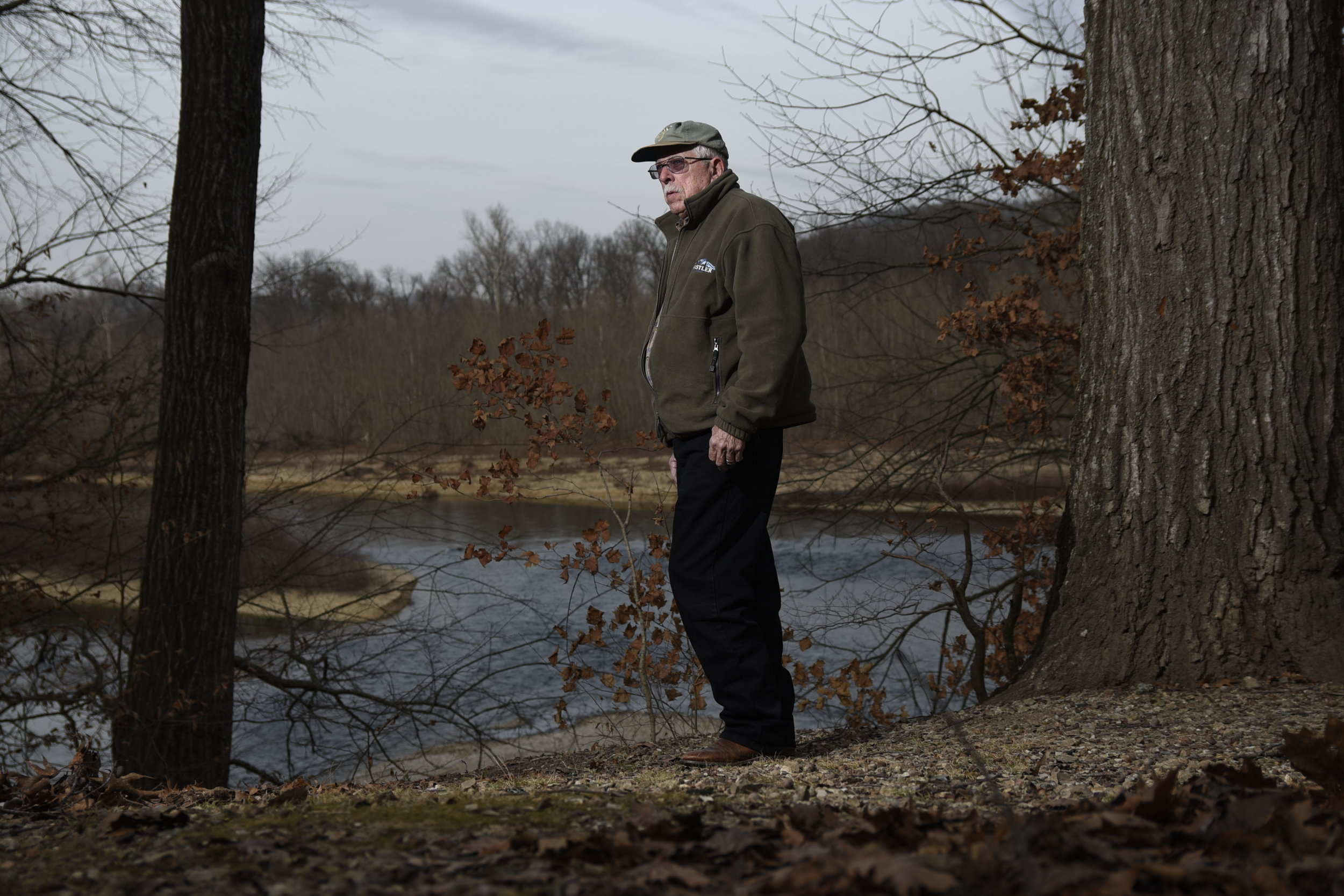  Ed Brocksmith poses along the Illinois River. He is a co-founder of the non-profit organization Save The Illinois River. CREDIT: Nick Oxford for The New York Times 