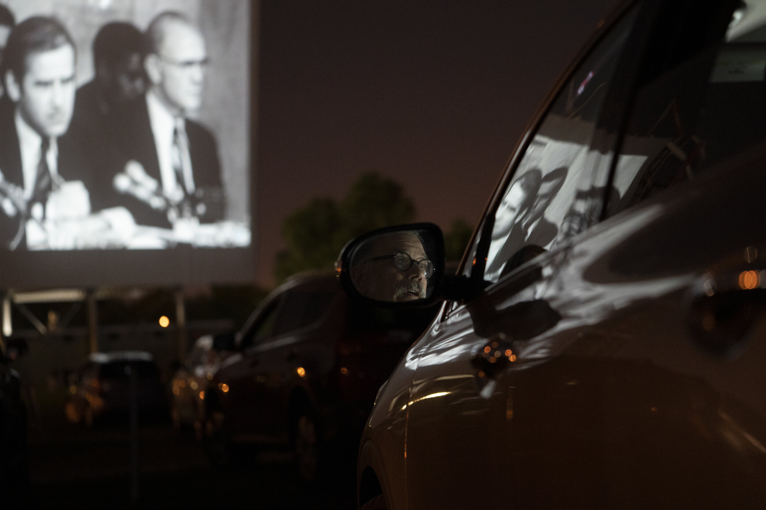  TULSA, OKLAHOMA - August 20: Demetrius Bereolos watches the final night of the DNC from his car at the Admiral Twin Drive In in Tulsa, Oklahoma on August 20, 2020. (Photo by Nick Oxford for The Washington Post) 