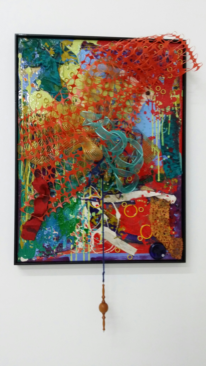 In My Head , paint, fabric, rubber, wood, ribbon and resin on canvas, 31"w x49"h x 10"d