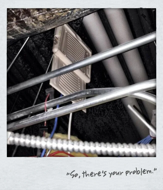 Saw this at a customer site where were upgrading the controller and seeing, “what's wrong with our wi-fi”?
So, what’s problem here? Glad you asked.
First, APs should never be above ceiling if you can help it. You want the RF as close to clients as you can, so why add another layer of separation?
Second, look at that AP! It’s surrounded on all sided by metal! Pipes and conduit above, below, to the side. And how about that foil covered air duct right next to it? You have RF bouncing all over the place before it gets a chance to get below the ceiling.E ven if the AP was MIMO capable (it’s not) the multi-path would be atrocious.
Don’t do this.