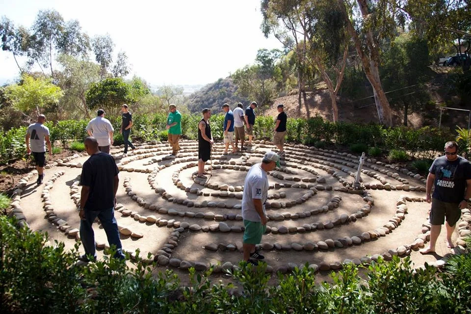 Warriors from Cohort 013 walk a labyrinth, which is an ancient contemplative practice that helps Warriors to reflect internally and leave behind painful parts of their pasts. Photo courtesy of Garrett Combs.
