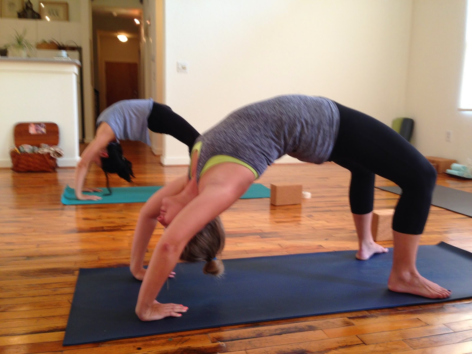 Michelle and Cathryn in Wheel Pose