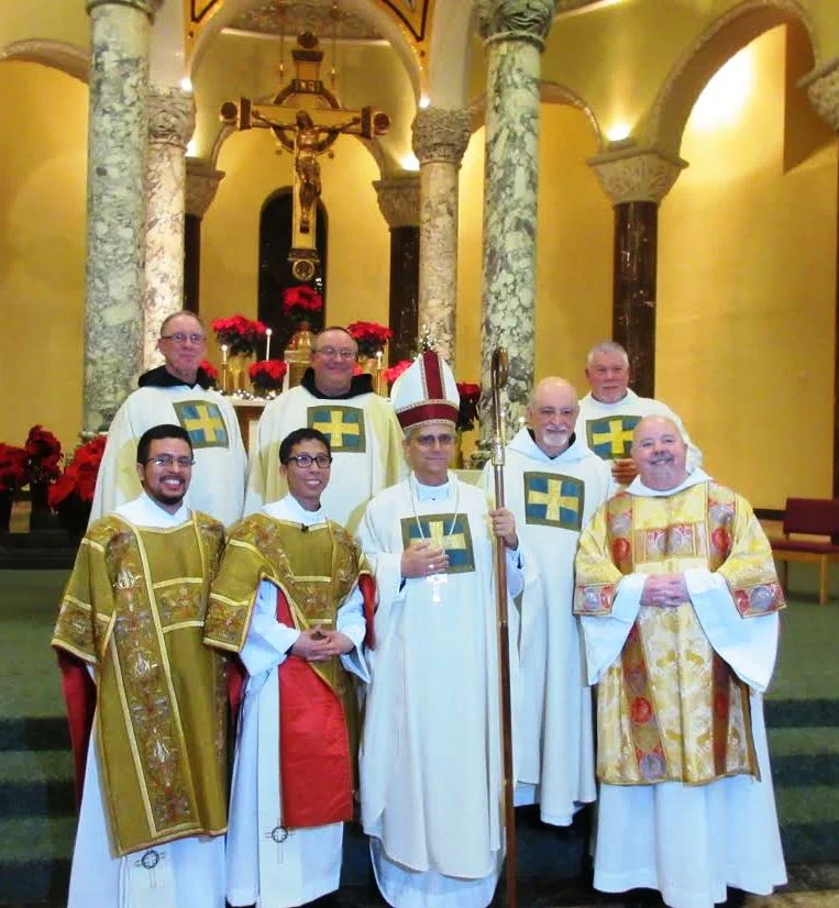 Brothers Carlos Medina, Richie Mercado and Joe Murray (row 1, l-r) are pictured with Bishop Robert Prevost (center) and the Priors Provincial of the California, Midwest and Villanova Provinces.