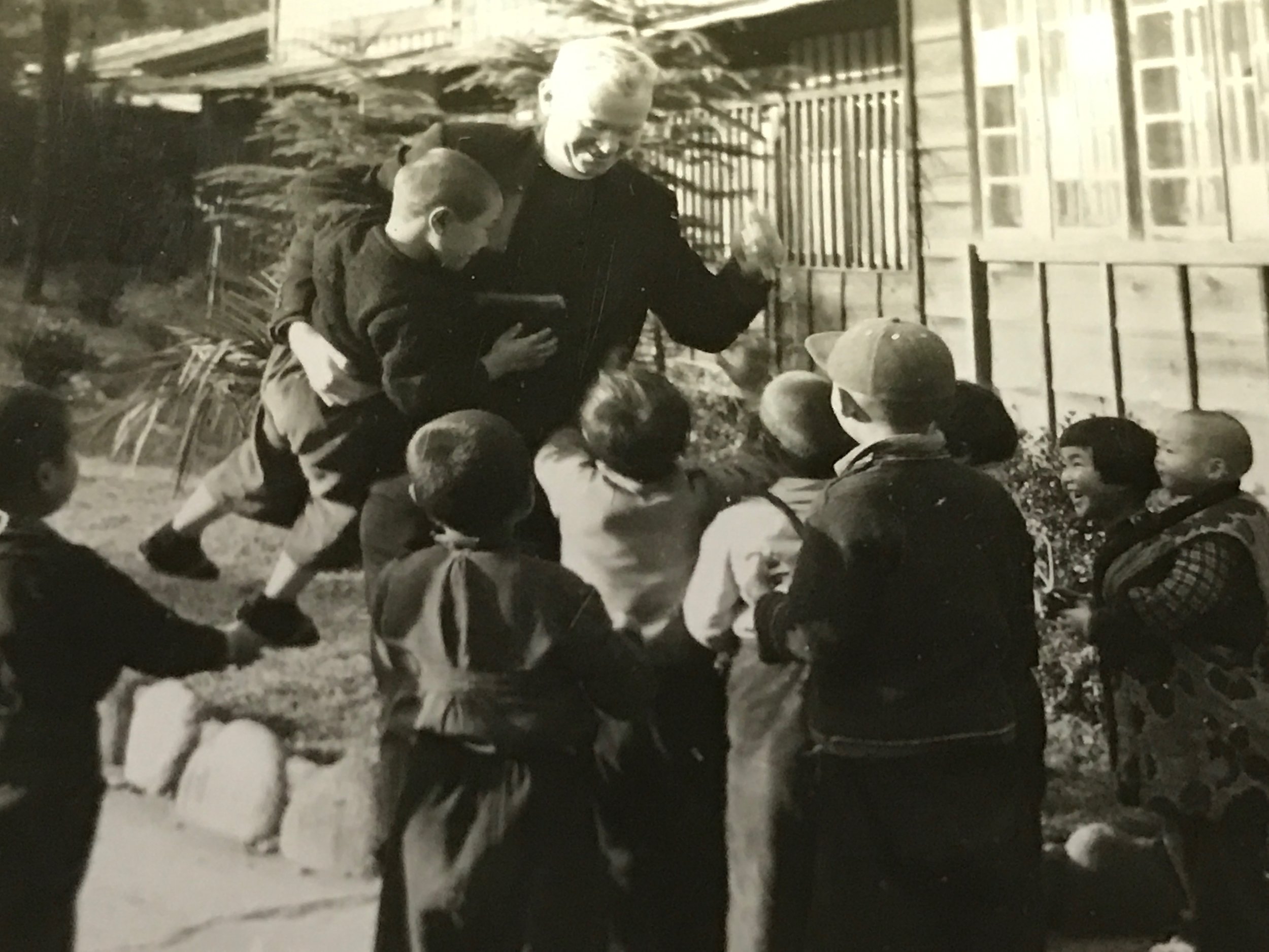 1954 Nagasaki--Father Purcell with Japanese Children