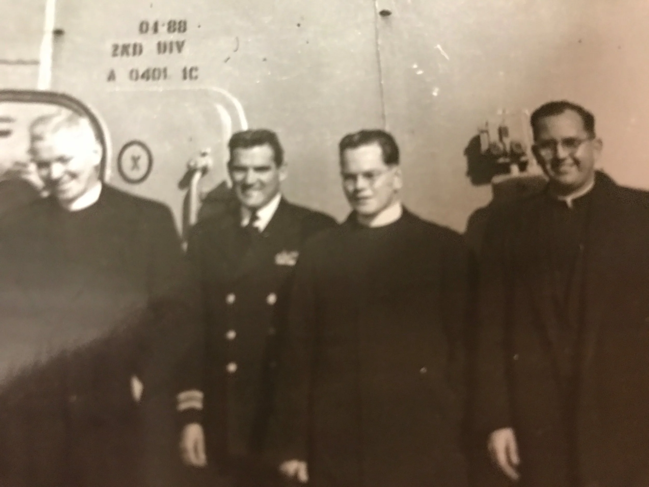 10/26/1952 Fathers Purcell, Robinson and Krupa aboard the SS. KYSKA to Yokohama, Japan