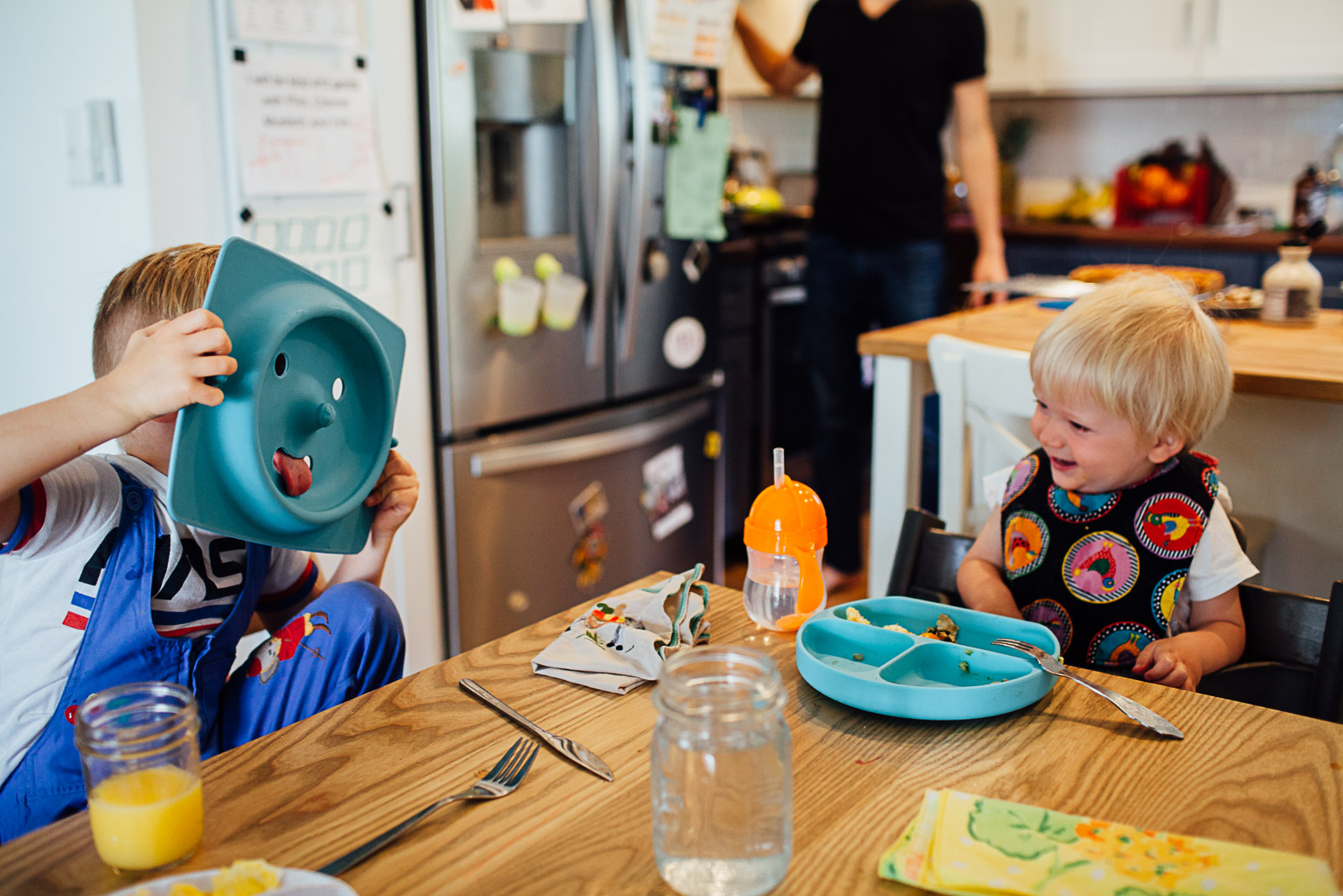 brothers laughing at breakfast