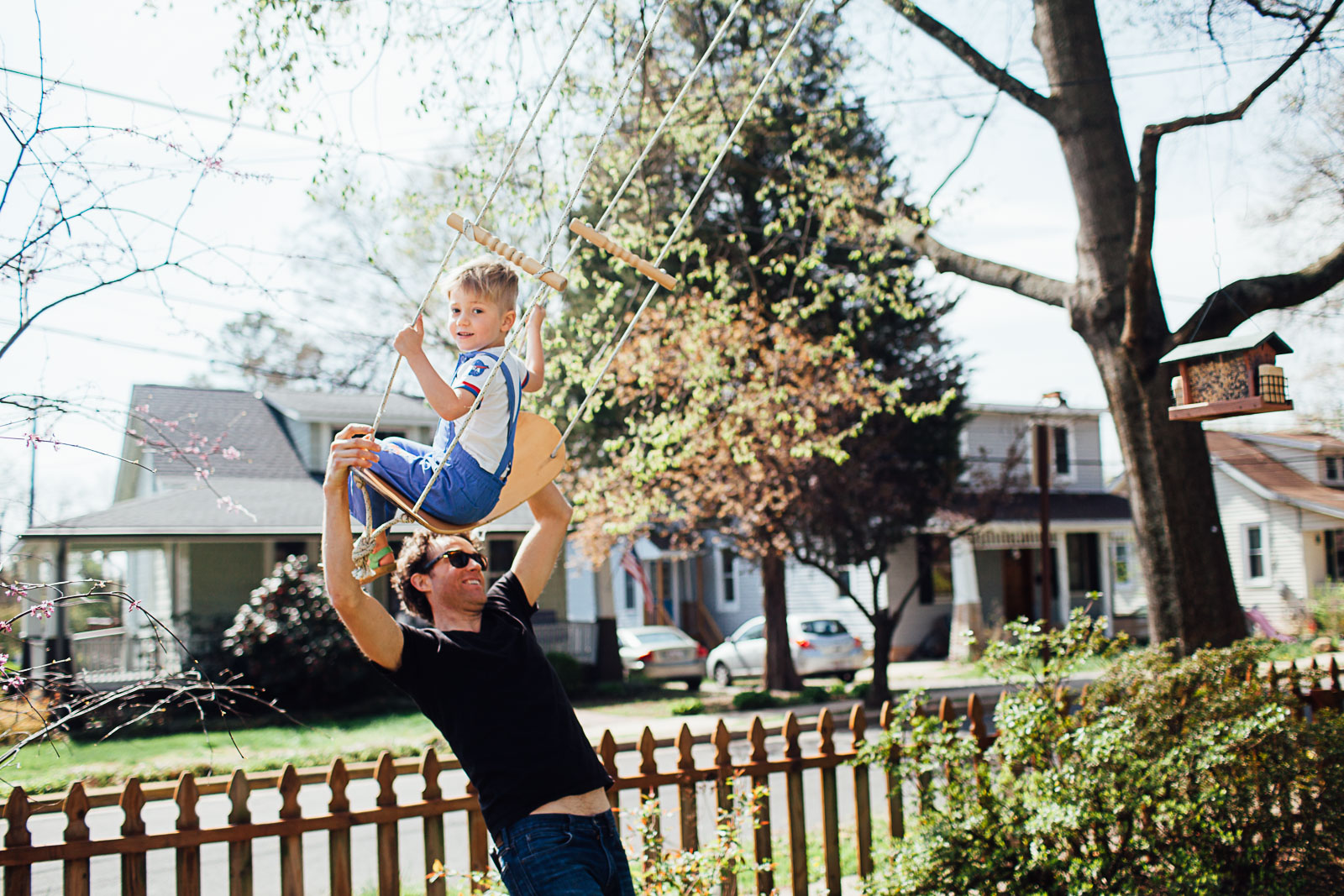 little boy on a surfer swing by Maryland Documentary photographer Juliette Fradin