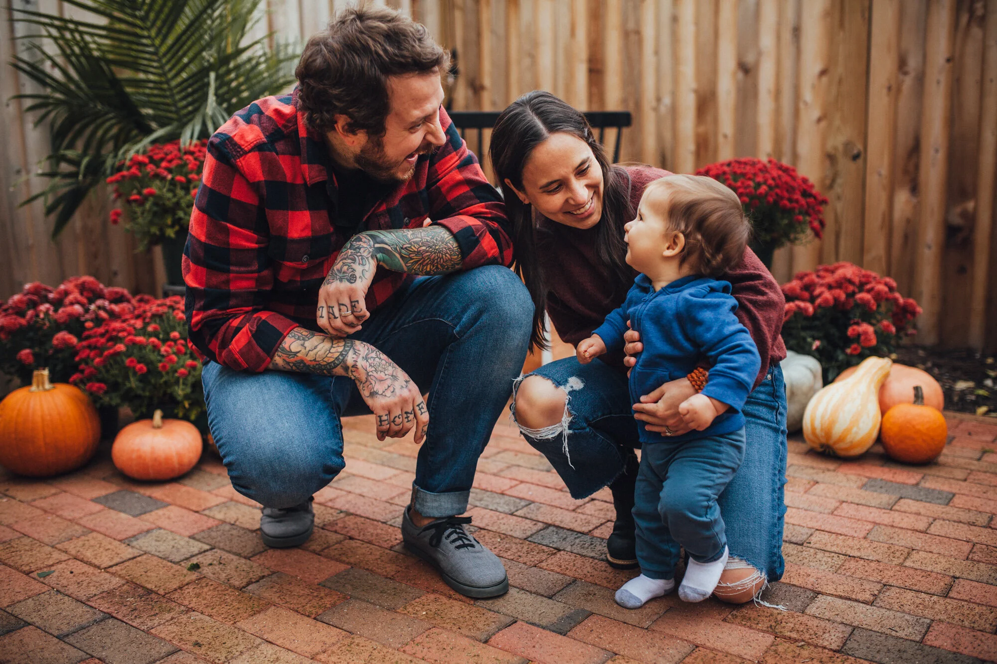 Family of 3 with baby in their courtyard-5.jpg