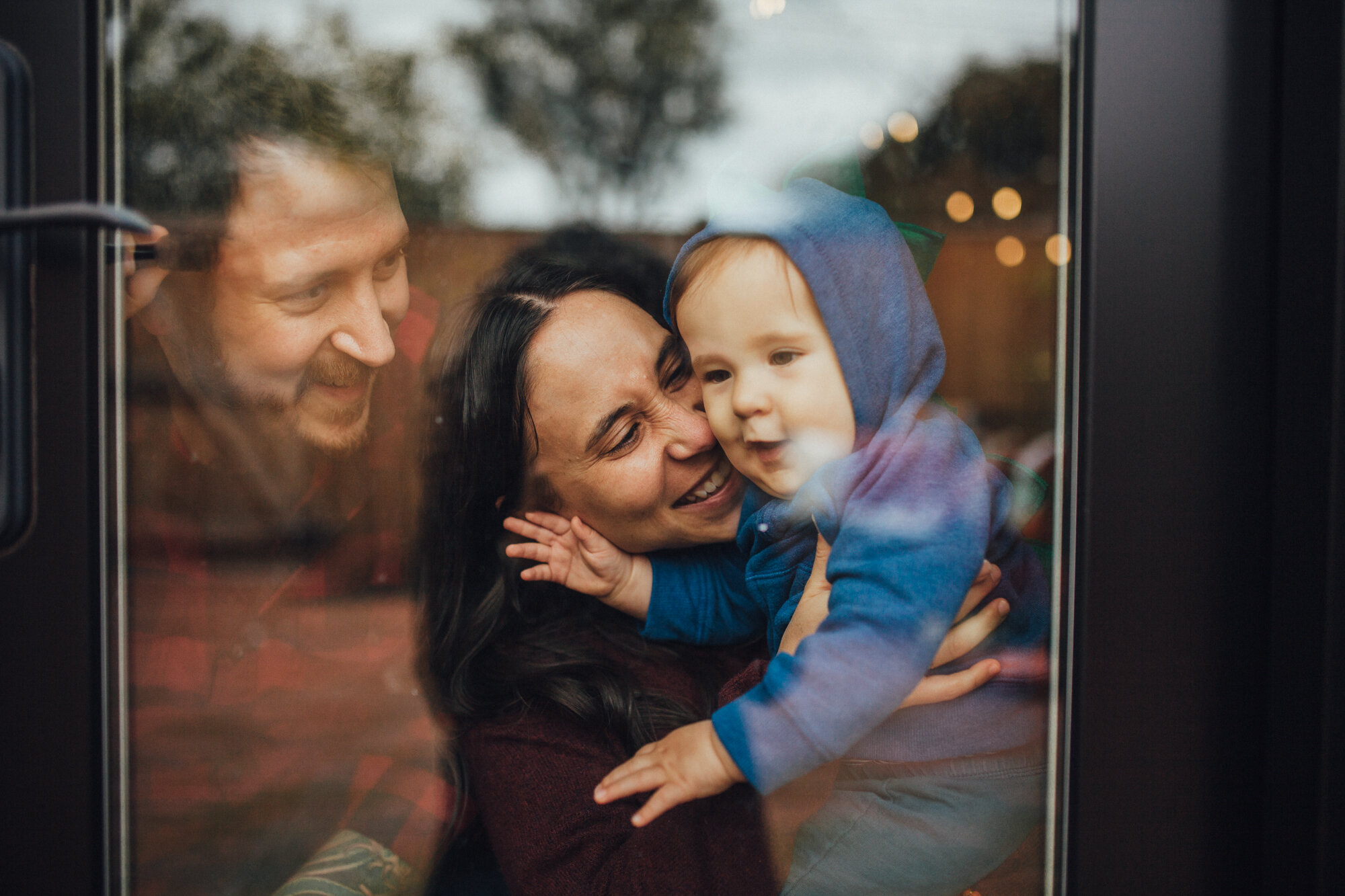 Family of 3 with baby in their courtyard-13.jpg