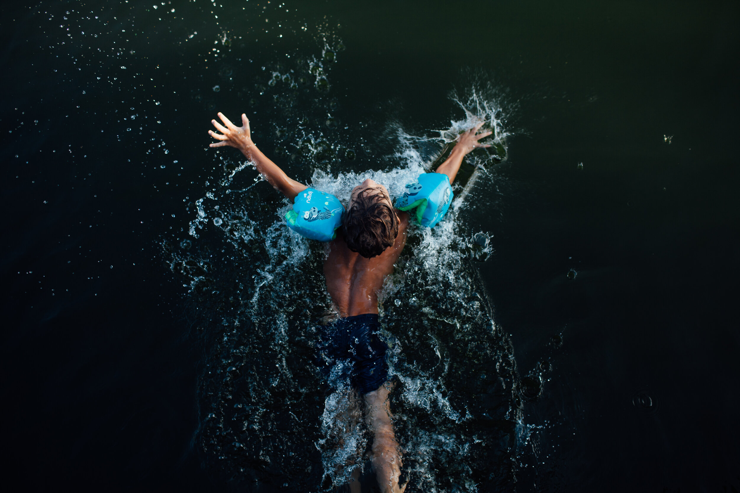 boy jumping in the water.jpg