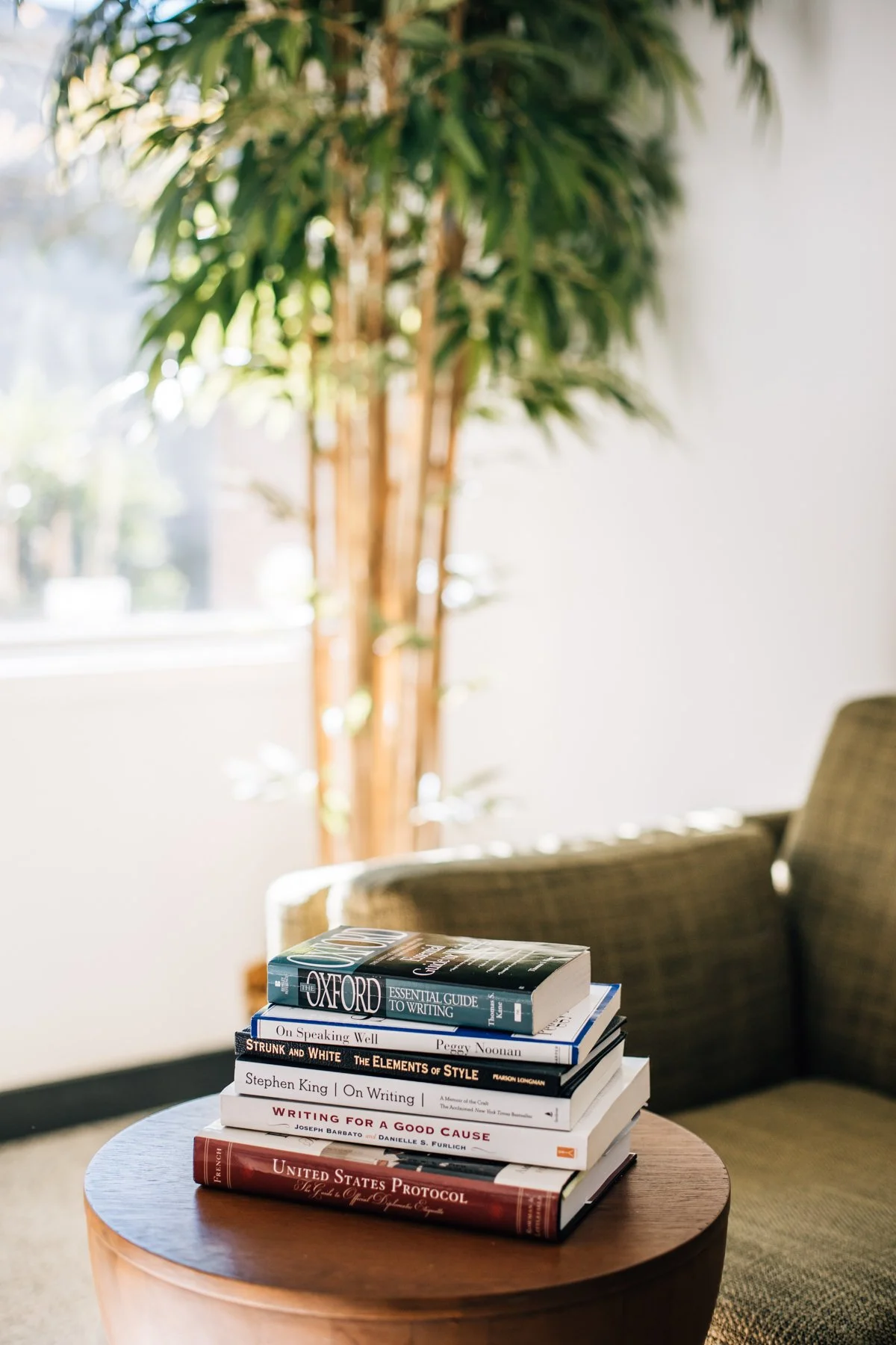 pile of books in office