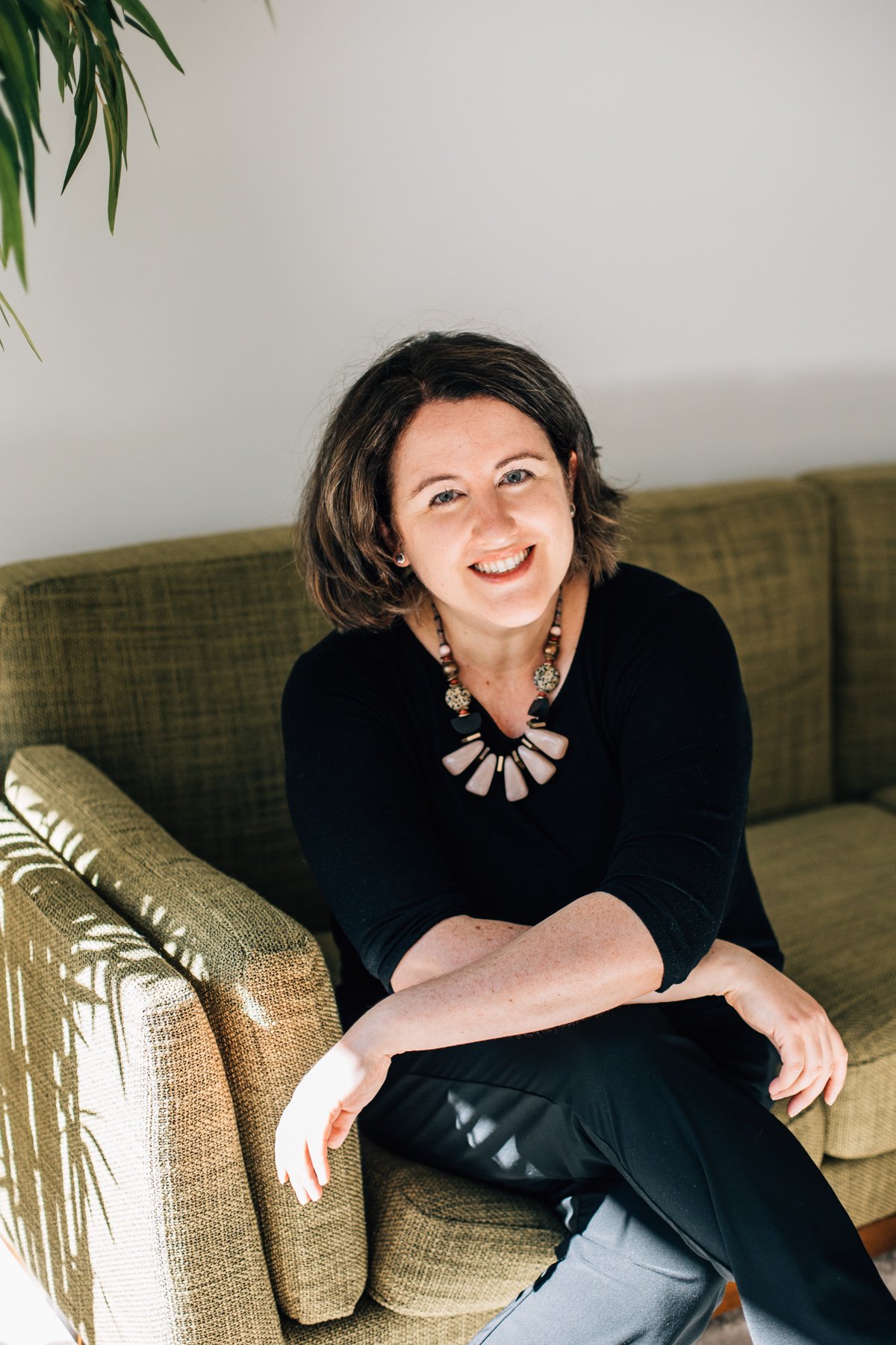 headshots of woman on a couch