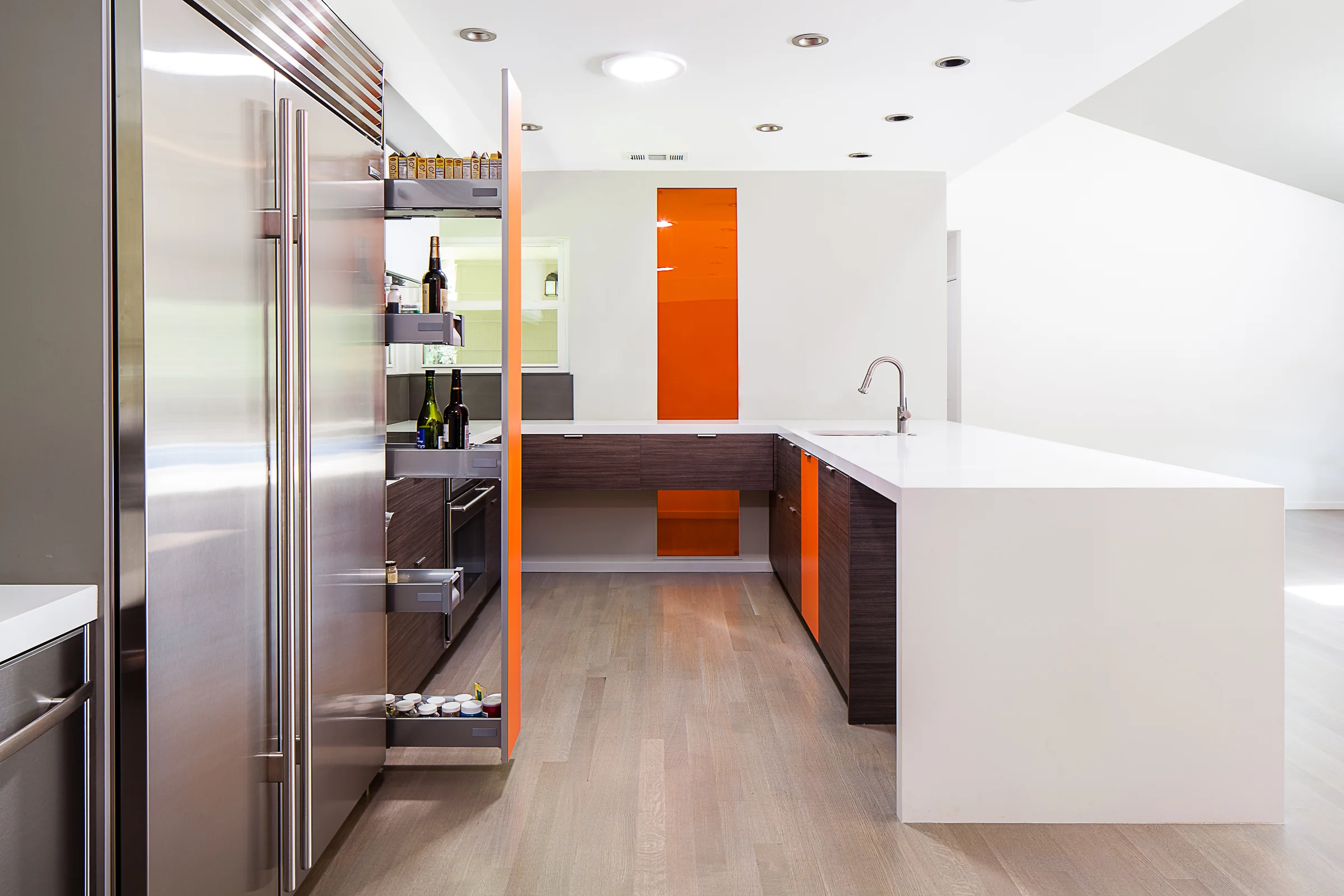Spices, oils and vinegars can be seen and accessed easily with our full-height drawer cabinets