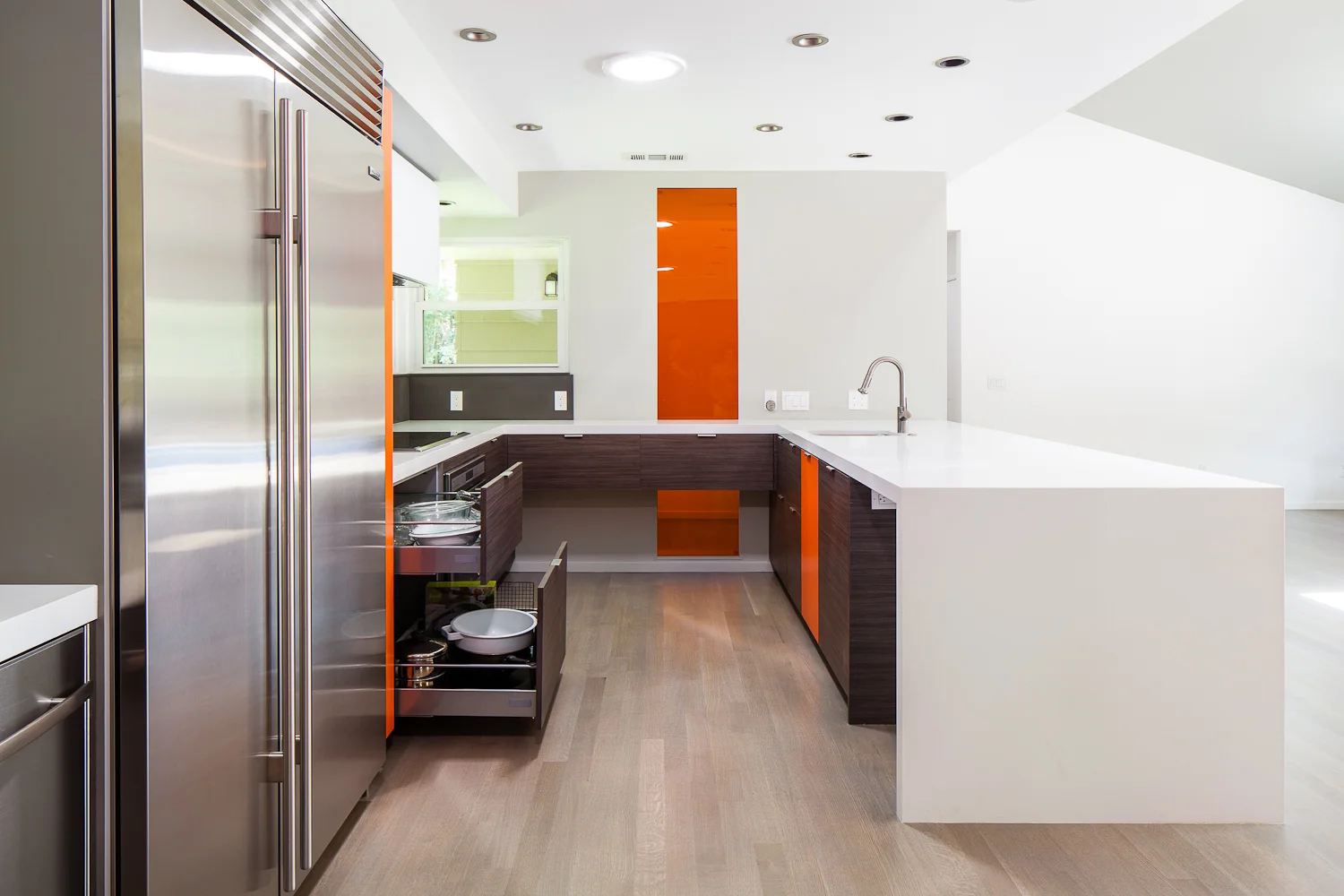 Drawers instead of doors in base cabinets allow for easier access, in addition to more usable storage