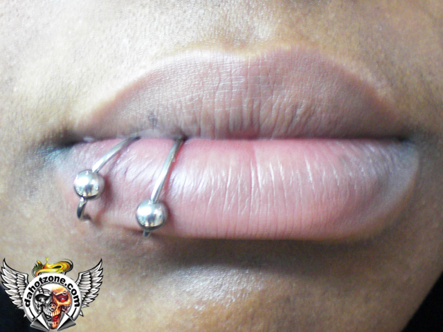Double lip piercing
