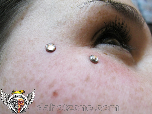 double dermal piercing face