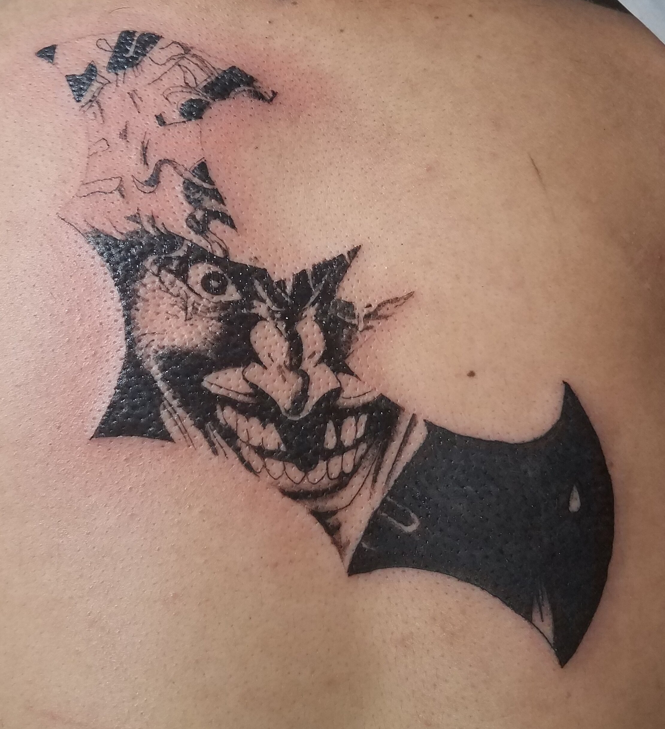 batman logo and joker