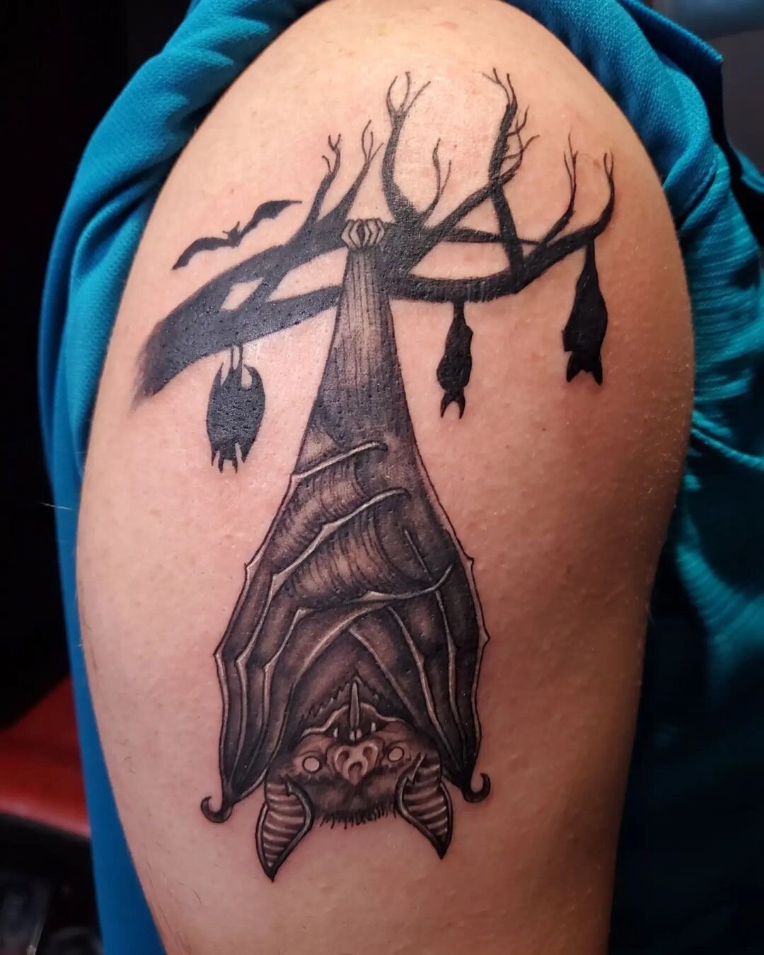Bat Hanging Upside Down Tattoo