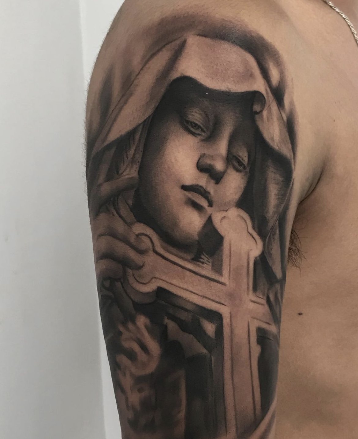 Angel And Stone Remembrance Tattoo On Left Half Sleeve