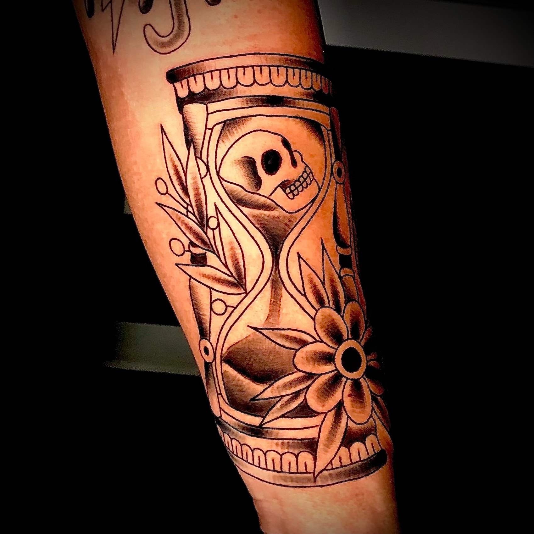 traditional hourglass with skull