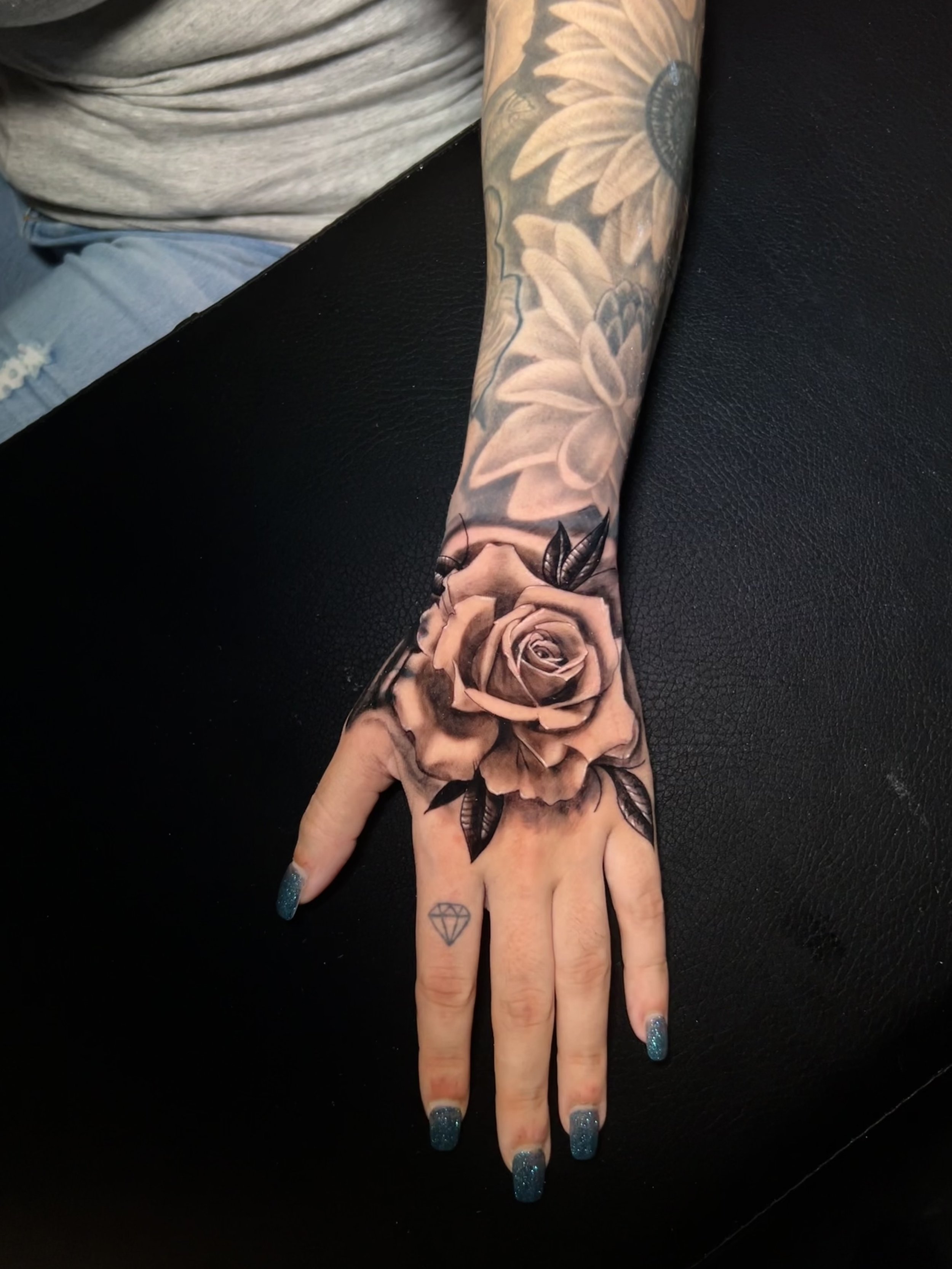 rose in the hand