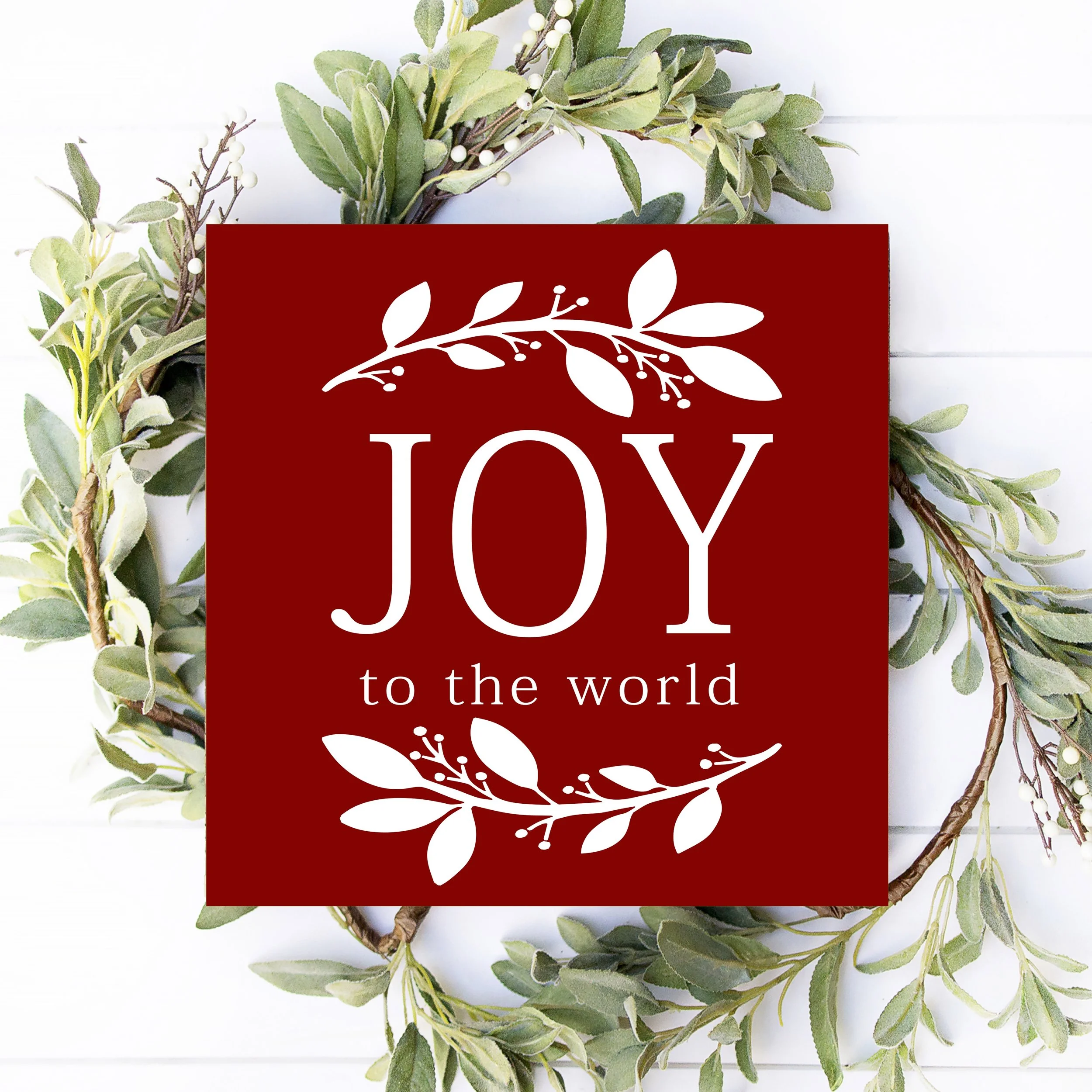 12x12 joy to the world flatlay mock up.jpg